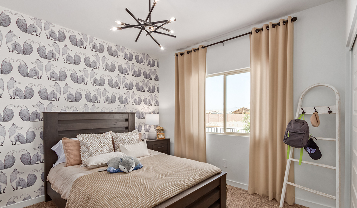 Step into The Kingston at Hanson Ridge in Vail Arizona – a perfect blend of comfort, modern living, and energy efficiency. This thoughtfully crafted single-story home spans 2,053 square feet and has four bedrooms and two bathrooms. This newly designed model offers harmony of comfort and desert elegance.  The open-concept design features a spacious great room that effortlessly connects with the kitchen and dining area, creating an inviting central hub for everyday living and entertaining. The kitchen is equipped with contemporary appliances and a pantry, offering ample storage and convenience for meal preparation and large center island. The primary bedroom, located at the rear of the home, provides a peaceful retreat with a private ensuite bathroom and a generous walk-in closet. The additional three bedrooms are positioned at the front of the house, offering versatility for use as guest rooms, a home office, or children’s bedrooms. Step outside to the covered patio, a perfect spot to enjoy the beautiful Arizona weather, whether for morning coffee or evening relaxation.  Built with energy efficiency as a priority, The Kingston includes smart home technology, which not only simplifies daily living but also helps reduce utility costs. A two-car garage provides ample parking and additional storage space, enhancing the home’s functionality. The Kingston at Hanson Ridge meets DOE Zero Energy Ready Home standards, ensuring sustainability and long-term savings.  Living at Hanson Ridge means more than just having a beautiful home. The community offers a peaceful lifestyle with incredible desert landscapes, mountain views, and easy access to I-10 for convenient commutes to Tucson and surrounding areas. Experience the charm and comfort of The Kingston at Hanson Ridge, where modern convenience meets the beauty of Arizona’s desert landscape.  *Images shown are for reference only. They depict the sales model home and may not represent the actual home.