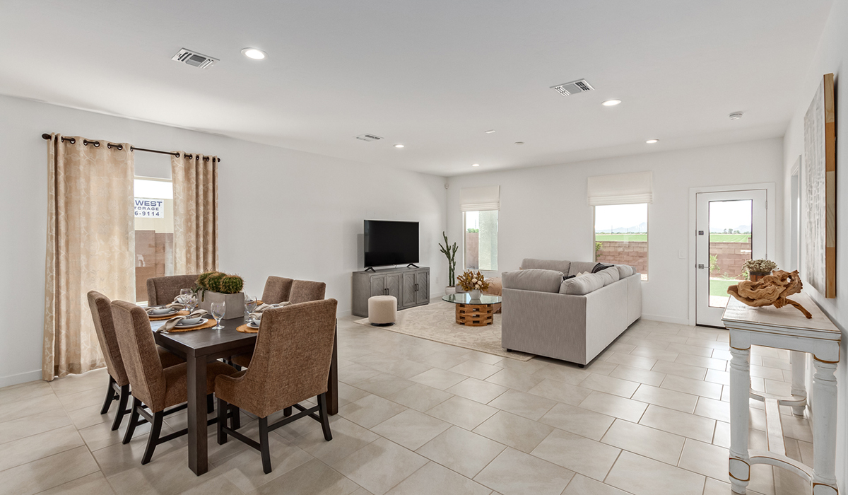 Step into The Kingston at Hanson Ridge in Vail Arizona – a perfect blend of comfort, modern living, and energy efficiency. This thoughtfully crafted single-story home spans 2,053 square feet and has four bedrooms and two bathrooms. This newly designed model offers harmony of comfort and desert elegance.  The open-concept design features a spacious great room that effortlessly connects with the kitchen and dining area, creating an inviting central hub for everyday living and entertaining. The kitchen is equipped with contemporary appliances and a pantry, offering ample storage and convenience for meal preparation and large center island. The primary bedroom, located at the rear of the home, provides a peaceful retreat with a private ensuite bathroom and a generous walk-in closet. The additional three bedrooms are positioned at the front of the house, offering versatility for use as guest rooms, a home office, or children’s bedrooms. Step outside to the covered patio, a perfect spot to enjoy the beautiful Arizona weather, whether for morning coffee or evening relaxation.  Built with energy efficiency as a priority, The Kingston includes smart home technology, which not only simplifies daily living but also helps reduce utility costs. A two-car garage provides ample parking and additional storage space, enhancing the home’s functionality. The Kingston at Hanson Ridge meets DOE Zero Energy Ready Home standards, ensuring sustainability and long-term savings.  Living at Hanson Ridge means more than just having a beautiful home. The community offers a peaceful lifestyle with incredible desert landscapes, mountain views, and easy access to I-10 for convenient commutes to Tucson and surrounding areas. Experience the charm and comfort of The Kingston at Hanson Ridge, where modern convenience meets the beauty of Arizona’s desert landscape.  *Images shown are for reference only. They depict the sales model home and may not represent the actual home.