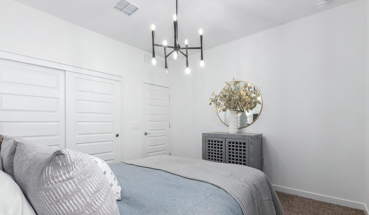 Step into The Kingston at Hanson Ridge in Vail Arizona – a perfect blend of comfort, modern living, and energy efficiency. This thoughtfully crafted single-story home spans 2,053 square feet and has four bedrooms and two bathrooms. This newly designed model offers harmony of comfort and desert elegance.  The open-concept design features a spacious great room that effortlessly connects with the kitchen and dining area, creating an inviting central hub for everyday living and entertaining. The kitchen is equipped with contemporary appliances and a pantry, offering ample storage and convenience for meal preparation and large center island. The primary bedroom, located at the rear of the home, provides a peaceful retreat with a private ensuite bathroom and a generous walk-in closet. The additional three bedrooms are positioned at the front of the house, offering versatility for use as guest rooms, a home office, or children’s bedrooms. Step outside to the covered patio, a perfect spot to enjoy the beautiful Arizona weather, whether for morning coffee or evening relaxation.  Built with energy efficiency as a priority, The Kingston includes smart home technology, which not only simplifies daily living but also helps reduce utility costs. A two-car garage provides ample parking and additional storage space, enhancing the home’s functionality. The Kingston at Hanson Ridge meets DOE Zero Energy Ready Home standards, ensuring sustainability and long-term savings.  Living at Hanson Ridge means more than just having a beautiful home. The community offers a peaceful lifestyle with incredible desert landscapes, mountain views, and easy access to I-10 for convenient commutes to Tucson and surrounding areas. Experience the charm and comfort of The Kingston at Hanson Ridge, where modern convenience meets the beauty of Arizona’s desert landscape.