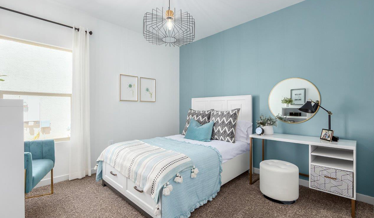 Step into The Kingston at Hanson Ridge in Vail Arizona – a perfect blend of comfort, modern living, and energy efficiency. This thoughtfully crafted single-story home spans 2,053 square feet and has four bedrooms and two bathrooms. This newly designed model offers harmony of comfort and desert elegance.  The open-concept design features a spacious great room that effortlessly connects with the kitchen and dining area, creating an inviting central hub for everyday living and entertaining. The kitchen is equipped with contemporary appliances and a pantry, offering ample storage and convenience for meal preparation and large center island. The primary bedroom, located at the rear of the home, provides a peaceful retreat with a private ensuite bathroom and a generous walk-in closet. The additional three bedrooms are positioned at the front of the house, offering versatility for use as guest rooms, a home office, or children’s bedrooms. Step outside to the covered patio, a perfect spot to enjoy the beautiful Arizona weather, whether for morning coffee or evening relaxation.  Built with energy efficiency as a priority, The Kingston includes smart home technology, which not only simplifies daily living but also helps reduce utility costs. A two-car garage provides ample parking and additional storage space, enhancing the home’s functionality. The Kingston at Hanson Ridge meets DOE Zero Energy Ready Home standards, ensuring sustainability and long-term savings.  Living at Hanson Ridge means more than just having a beautiful home. The community offers a peaceful lifestyle with incredible desert landscapes, mountain views, and easy access to I-10 for convenient commutes to Tucson and surrounding areas. Experience the charm and comfort of The Kingston at Hanson Ridge, where modern convenience meets the beauty of Arizona’s desert landscape.