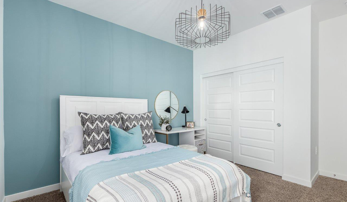 Step into The Kingston at Hanson Ridge in Vail Arizona – a perfect blend of comfort, modern living, and energy efficiency. This thoughtfully crafted single-story home spans 2,053 square feet and has four bedrooms and two bathrooms. This newly designed model offers harmony of comfort and desert elegance.  The open-concept design features a spacious great room that effortlessly connects with the kitchen and dining area, creating an inviting central hub for everyday living and entertaining. The kitchen is equipped with contemporary appliances and a pantry, offering ample storage and convenience for meal preparation and large center island. The primary bedroom, located at the rear of the home, provides a peaceful retreat with a private ensuite bathroom and a generous walk-in closet. The additional three bedrooms are positioned at the front of the house, offering versatility for use as guest rooms, a home office, or children’s bedrooms. Step outside to the covered patio, a perfect spot to enjoy the beautiful Arizona weather, whether for morning coffee or evening relaxation.  Built with energy efficiency as a priority, The Kingston includes smart home technology, which not only simplifies daily living but also helps reduce utility costs. A two-car garage provides ample parking and additional storage space, enhancing the home’s functionality. The Kingston at Hanson Ridge meets DOE Zero Energy Ready Home standards, ensuring sustainability and long-term savings.  Living at Hanson Ridge means more than just having a beautiful home. The community offers a peaceful lifestyle with incredible desert landscapes, mountain views, and easy access to I-10 for convenient commutes to Tucson and surrounding areas. Experience the charm and comfort of The Kingston at Hanson Ridge, where modern convenience meets the beauty of Arizona’s desert landscape.