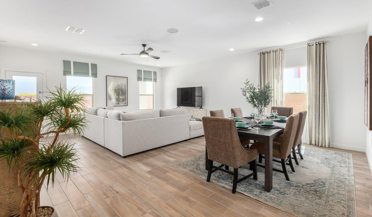 Step into The Kingston at Hanson Ridge in Vail Arizona – a perfect blend of comfort, modern living, and energy efficiency. This thoughtfully crafted single-story home spans 2,053 square feet and has four bedrooms and two bathrooms. This newly designed model offers harmony of comfort and desert elegance.  The open-concept design features a spacious great room that effortlessly connects with the kitchen and dining area, creating an inviting central hub for everyday living and entertaining. The kitchen is equipped with contemporary appliances and a pantry, offering ample storage and convenience for meal preparation and large center island. The primary bedroom, located at the rear of the home, provides a peaceful retreat with a private ensuite bathroom and a generous walk-in closet. The additional three bedrooms are positioned at the front of the house, offering versatility for use as guest rooms, a home office, or children’s bedrooms. Step outside to the covered patio, a perfect spot to enjoy the beautiful Arizona weather, whether for morning coffee or evening relaxation.  Built with energy efficiency as a priority, The Kingston includes smart home technology, which not only simplifies daily living but also helps reduce utility costs. A two-car garage provides ample parking and additional storage space, enhancing the home’s functionality. The Kingston at Hanson Ridge meets DOE Zero Energy Ready Home standards, ensuring sustainability and long-term savings.  Living at Hanson Ridge means more than just having a beautiful home. The community offers a peaceful lifestyle with incredible desert landscapes, mountain views, and easy access to I-10 for convenient commutes to Tucson and surrounding areas. Experience the charm and comfort of The Kingston at Hanson Ridge, where modern convenience meets the beauty of Arizona’s desert landscape.