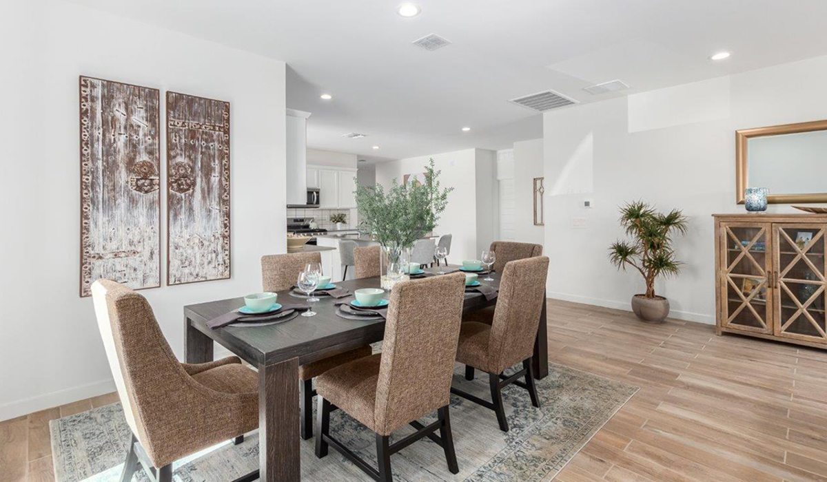 Step into The Kingston at Hanson Ridge in Vail Arizona – a perfect blend of comfort, modern living, and energy efficiency. This thoughtfully crafted single-story home spans 2,053 square feet and has four bedrooms and two bathrooms. This newly designed model offers harmony of comfort and desert elegance.  The open-concept design features a spacious great room that effortlessly connects with the kitchen and dining area, creating an inviting central hub for everyday living and entertaining. The kitchen is equipped with contemporary appliances and a pantry, offering ample storage and convenience for meal preparation and large center island. The primary bedroom, located at the rear of the home, provides a peaceful retreat with a private ensuite bathroom and a generous walk-in closet. The additional three bedrooms are positioned at the front of the house, offering versatility for use as guest rooms, a home office, or children’s bedrooms. Step outside to the covered patio, a perfect spot to enjoy the beautiful Arizona weather, whether for morning coffee or evening relaxation.  Built with energy efficiency as a priority, The Kingston includes smart home technology, which not only simplifies daily living but also helps reduce utility costs. A two-car garage provides ample parking and additional storage space, enhancing the home’s functionality. The Kingston at Hanson Ridge meets DOE Zero Energy Ready Home standards, ensuring sustainability and long-term savings.  Living at Hanson Ridge means more than just having a beautiful home. The community offers a peaceful lifestyle with incredible desert landscapes, mountain views, and easy access to I-10 for convenient commutes to Tucson and surrounding areas. Experience the charm and comfort of The Kingston at Hanson Ridge, where modern convenience meets the beauty of Arizona’s desert landscape.