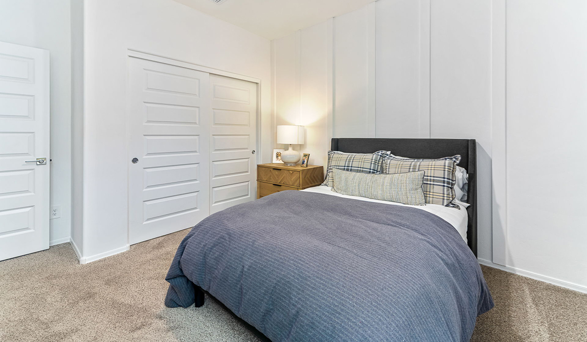 Step into The Kingston at Hanson Ridge in Vail Arizona – a perfect blend of comfort, modern living, and energy efficiency. This thoughtfully crafted single-story home spans 2,053 square feet and has four bedrooms and two bathrooms. This newly designed model offers harmony of comfort and desert elegance.  The open-concept design features a spacious great room that effortlessly connects with the kitchen and dining area, creating an inviting central hub for everyday living and entertaining. The kitchen is equipped with contemporary appliances and a pantry, offering ample storage and convenience for meal preparation and large center island. The primary bedroom, located at the rear of the home, provides a peaceful retreat with a private ensuite bathroom and a generous walk-in closet. The additional three bedrooms are positioned at the front of the house, offering versatility for use as guest rooms, a home office, or children’s bedrooms. Step outside to the covered patio, a perfect spot to enjoy the beautiful Arizona weather, whether for morning coffee or evening relaxation.  Built with energy efficiency as a priority, The Kingston includes smart home technology, which not only simplifies daily living but also helps reduce utility costs. A two-car garage provides ample parking and additional storage space, enhancing the home’s functionality. The Kingston at Hanson Ridge meets DOE Zero Energy Ready Home standards, ensuring sustainability and long-term savings.  Living at Hanson Ridge means more than just having a beautiful home. The community offers a peaceful lifestyle with incredible desert landscapes, mountain views, and easy access to I-10 for convenient commutes to Tucson and surrounding areas. Experience the charm and comfort of The Kingston at Hanson Ridge, where modern convenience meets the beauty of Arizona’s desert landscape.  *Images shown are for reference only. They depict the Kingston model home and may not represent the actual home.