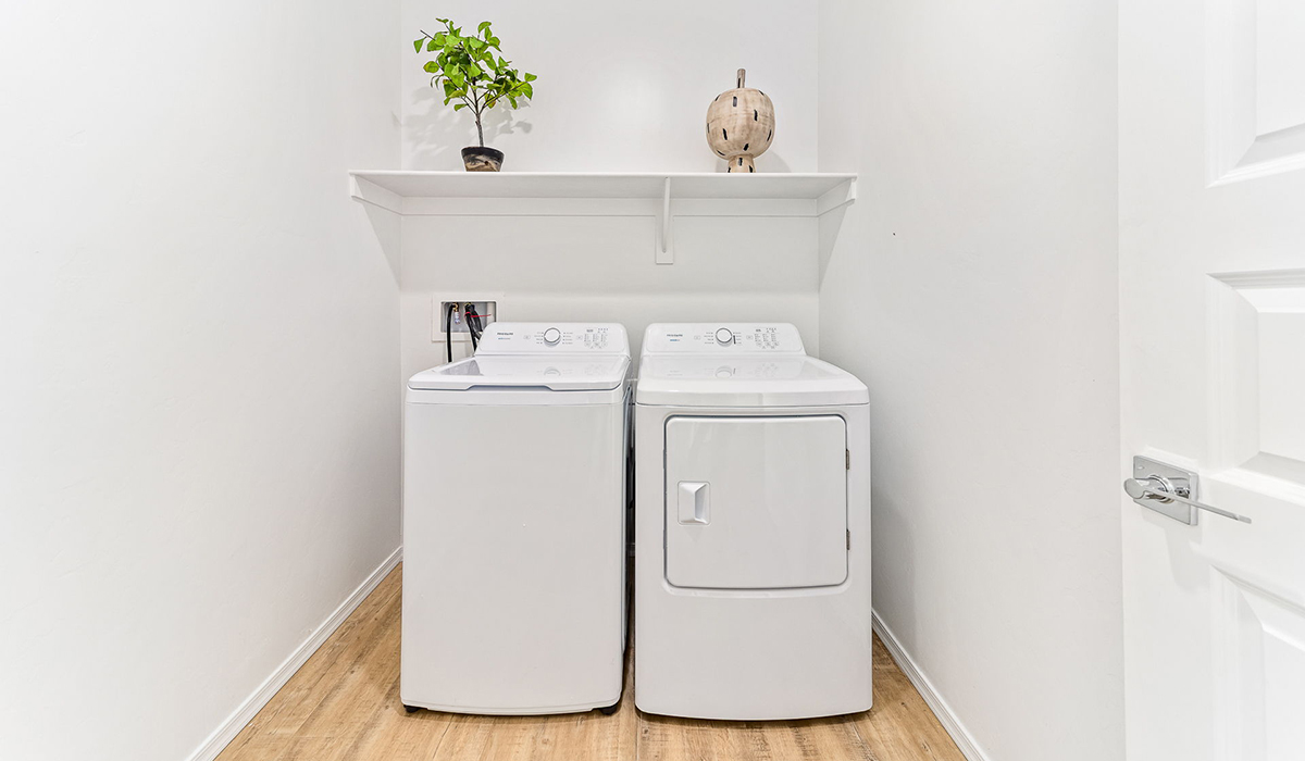 Step into The Kingston at Hanson Ridge in Vail Arizona – a perfect blend of comfort, modern living, and energy efficiency. This thoughtfully crafted single-story home spans 2,053 square feet and has four bedrooms and two bathrooms. This newly designed model offers harmony of comfort and desert elegance.  The open-concept design features a spacious great room that effortlessly connects with the kitchen and dining area, creating an inviting central hub for everyday living and entertaining. The kitchen is equipped with contemporary appliances and a pantry, offering ample storage and convenience for meal preparation and large center island. The primary bedroom, located at the rear of the home, provides a peaceful retreat with a private ensuite bathroom and a generous walk-in closet. The additional three bedrooms are positioned at the front of the house, offering versatility for use as guest rooms, a home office, or children’s bedrooms. Step outside to the covered patio, a perfect spot to enjoy the beautiful Arizona weather, whether for morning coffee or evening relaxation.  Built with energy efficiency as a priority, The Kingston includes smart home technology, which not only simplifies daily living but also helps reduce utility costs. A two-car garage provides ample parking and additional storage space, enhancing the home’s functionality. The Kingston at Hanson Ridge meets DOE Zero Energy Ready Home standards, ensuring sustainability and long-term savings.  Living at Hanson Ridge means more than just having a beautiful home. The community offers a peaceful lifestyle with incredible desert landscapes, mountain views, and easy access to I-10 for convenient commutes to Tucson and surrounding areas. Experience the charm and comfort of The Kingston at Hanson Ridge, where modern convenience meets the beauty of Arizona’s desert landscape.  *Images shown are for reference only. They depict the Kingston model home and may not represent the actual home.