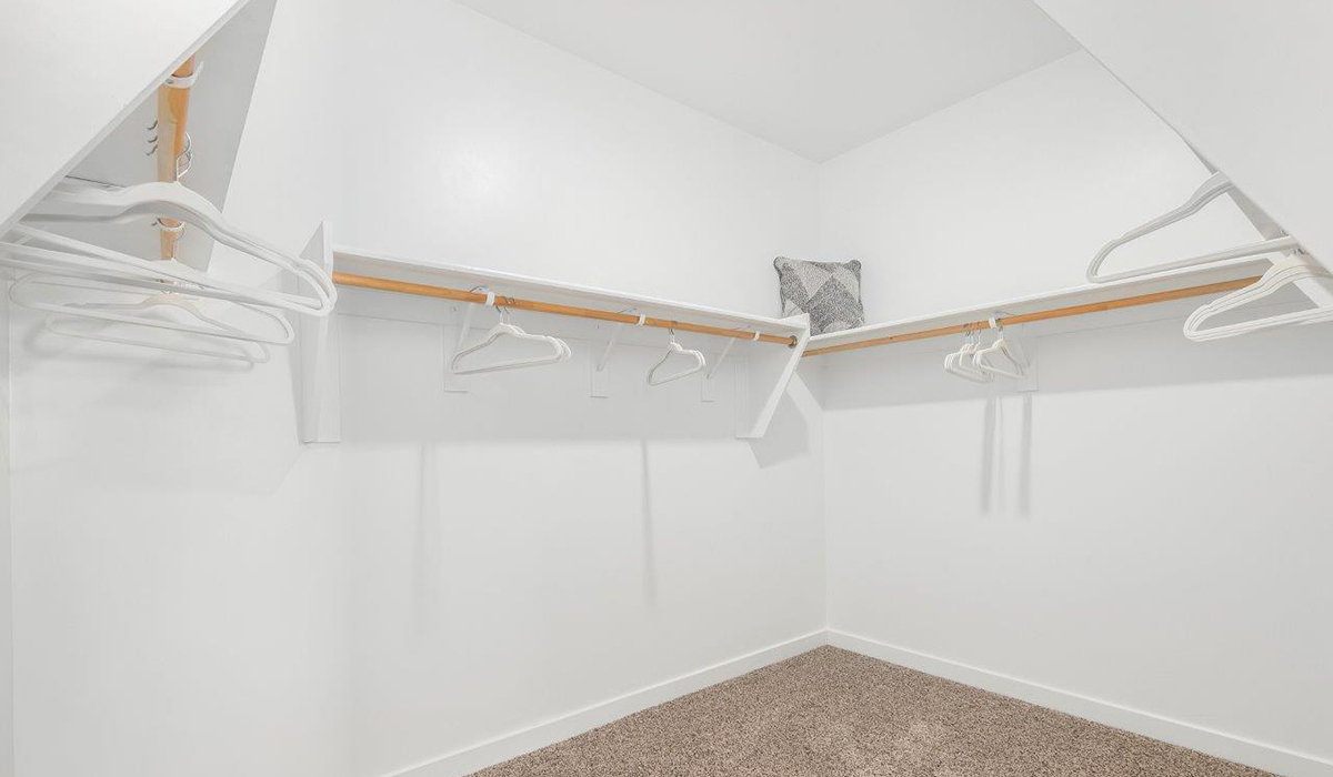 Step into The Kingston at Hanson Ridge in Vail Arizona – a perfect blend of comfort, modern living, and energy efficiency. This thoughtfully crafted single-story home spans 2,053 square feet and has four bedrooms and two bathrooms. This newly designed model offers harmony of comfort and desert elegance.  The open-concept design features a spacious great room that effortlessly connects with the kitchen and dining area, creating an inviting central hub for everyday living and entertaining. The kitchen is equipped with contemporary appliances and a pantry, offering ample storage and convenience for meal preparation and large center island. The primary bedroom, located at the rear of the home, provides a peaceful retreat with a private ensuite bathroom and a generous walk-in closet. The additional three bedrooms are positioned at the front of the house, offering versatility for use as guest rooms, a home office, or children’s bedrooms. Step outside to the covered patio, a perfect spot to enjoy the beautiful Arizona weather, whether for morning coffee or evening relaxation.  Built with energy efficiency as a priority, The Kingston includes smart home technology, which not only simplifies daily living but also helps reduce utility costs. A two-car garage provides ample parking and additional storage space, enhancing the home’s functionality. The Kingston at Hanson Ridge meets DOE Zero Energy Ready Home standards, ensuring sustainability and long-term savings.  Living at Hanson Ridge means more than just having a beautiful home. The community offers a peaceful lifestyle with incredible desert landscapes, mountain views, and easy access to I-10 for convenient commutes to Tucson and surrounding areas. Experience the charm and comfort of The Kingston at Hanson Ridge, where modern convenience meets the beauty of Arizona’s desert landscape.