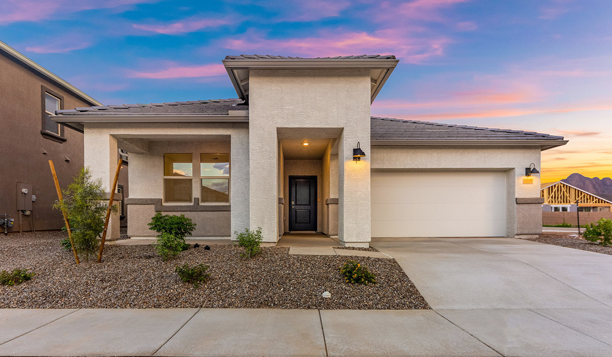 Discover the Dalea at Hanson Ridge in Vail, Arizona - a beautifully designed single-story home that perfectly balances comfort and elegance. This thoughtfully crafted floor plan offers two spacious layout options: a 2,058 sq. ft. home featuring four bedrooms and a 3-car tandem garage, or a 2,224 sq. ft. layout with five bedrooms and a two-car garage. Whether you're looking for extra space or a more open layout, the Dalea is designed to suit your lifestyle with style and functionality in every detail.  As you enter through the inviting front porch, you're welcomed into a bright and airy living space that flows seamlessly into the great room, dining area, and kitchen. This open-concept design is perfect for both family gatherings and entertaining. The kitchen features Quartz countertops, Shaker Style Cabinetry, modern appliances, and a convenient pantry, making meal preparation a breeze.  The primary suite, located at the rear of the home, providing a private retreat with a spacious a large walk-in closet, and en-suite bathroom featuring dual vanities and a walk-in shower. This suite offers a peaceful escape, ideal for relaxation. This thoughtfully designed four to five-bedroom home offers privacy and comfort with three bathrooms. The Dalea plan also includes a utility room and two-car garage with the option of three-car garage.   Living at Hanson Ridge means more than just having a beautiful home. The community offers a peaceful lifestyle with incredible desert landscapes, mountain views, and easy access to I-10 for convenient commutes to Tucson and surrounding areas. Designed with energy efficiency in mind, The Dalea at Hanson Ridge meets Zero Energy Ready Home standards, ensuring sustainability and long-term savings.  Experience the charm and comfort of The Dalea at Hanson Ridge, where modern convenience meets the beauty of Arizona’s desert landscape.  *Images shown are for reference only. They depict The Dalea spec home and may not represent the actual home.