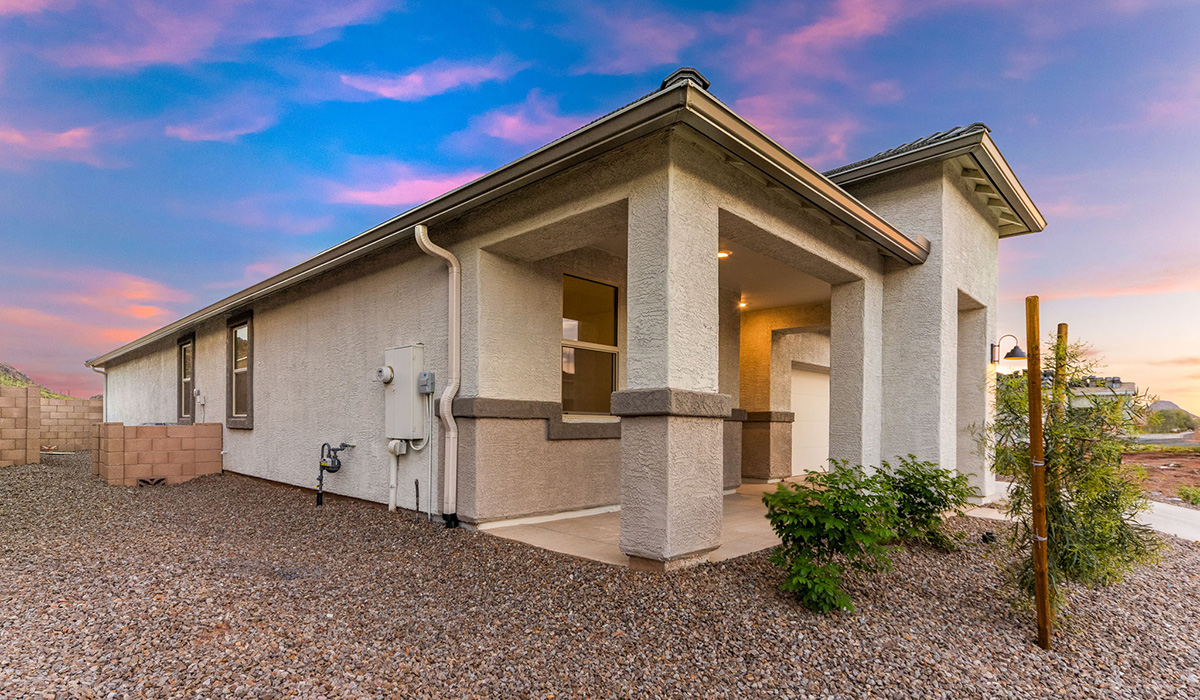 Discover the Dalea at Hanson Ridge in Vail, Arizona - a beautifully designed single-story home that perfectly balances comfort and elegance. This thoughtfully crafted floor plan offers two spacious layout options: a 2,058 sq. ft. home featuring four bedrooms and a 3-car tandem garage, or a 2,224 sq. ft. layout with five bedrooms and a two-car garage. Whether you're looking for extra space or a more open layout, the Dalea is designed to suit your lifestyle with style and functionality in every detail.  As you enter through the inviting front porch, you're welcomed into a bright and airy living space that flows seamlessly into the great room, dining area, and kitchen. This open-concept design is perfect for both family gatherings and entertaining. The kitchen features Quartz countertops, Shaker Style Cabinetry, modern appliances, and a convenient pantry, making meal preparation a breeze.  The primary suite, located at the rear of the home, providing a private retreat with a spacious a large walk-in closet, and en-suite bathroom featuring dual vanities and a walk-in shower. This suite offers a peaceful escape, ideal for relaxation. This thoughtfully designed four to five-bedroom home offers privacy and comfort with three bathrooms. The Dalea plan also includes a utility room and two-car garage with the option of three-car garage.   Living at Hanson Ridge means more than just having a beautiful home. The community offers a peaceful lifestyle with incredible desert landscapes, mountain views, and easy access to I-10 for convenient commutes to Tucson and surrounding areas. Designed with energy efficiency in mind, The Dalea at Hanson Ridge meets Zero Energy Ready Home standards, ensuring sustainability and long-term savings.  Experience the charm and comfort of The Dalea at Hanson Ridge, where modern convenience meets the beauty of Arizona’s desert landscape.  *Images shown are for reference only. They depict The Dalea spec home and may not represent the actual home.