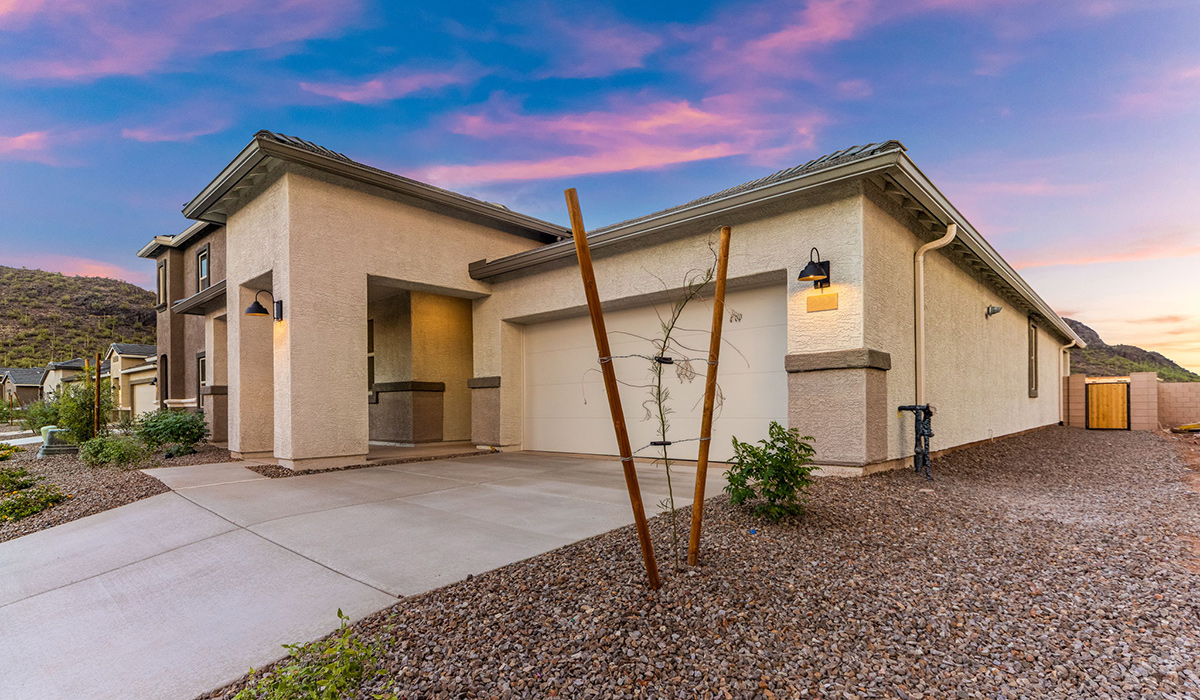 Discover the Dalea at Hanson Ridge in Vail, Arizona - a beautifully designed single-story home that perfectly balances comfort and elegance. This thoughtfully crafted floor plan offers two spacious layout options: a 2,058 sq. ft. home featuring four bedrooms and a 3-car tandem garage, or a 2,224 sq. ft. layout with five bedrooms and a two-car garage. Whether you're looking for extra space or a more open layout, the Dalea is designed to suit your lifestyle with style and functionality in every detail.  As you enter through the inviting front porch, you're welcomed into a bright and airy living space that flows seamlessly into the great room, dining area, and kitchen. This open-concept design is perfect for both family gatherings and entertaining. The kitchen features Quartz countertops, Shaker Style Cabinetry, modern appliances, and a convenient pantry, making meal preparation a breeze.  The primary suite, located at the rear of the home, providing a private retreat with a spacious a large walk-in closet, and en-suite bathroom featuring dual vanities and a walk-in shower. This suite offers a peaceful escape, ideal for relaxation. This thoughtfully designed four to five-bedroom home offers privacy and comfort with three bathrooms. The Dalea plan also includes a utility room and two-car garage with the option of three-car garage.   Living at Hanson Ridge means more than just having a beautiful home. The community offers a peaceful lifestyle with incredible desert landscapes, mountain views, and easy access to I-10 for convenient commutes to Tucson and surrounding areas. Designed with energy efficiency in mind, The Dalea at Hanson Ridge meets Zero Energy Ready Home standards, ensuring sustainability and long-term savings.  Experience the charm and comfort of The Dalea at Hanson Ridge, where modern convenience meets the beauty of Arizona’s desert landscape.  *Images shown are for reference only. They depict The Dalea spec home and may not represent the actual home.