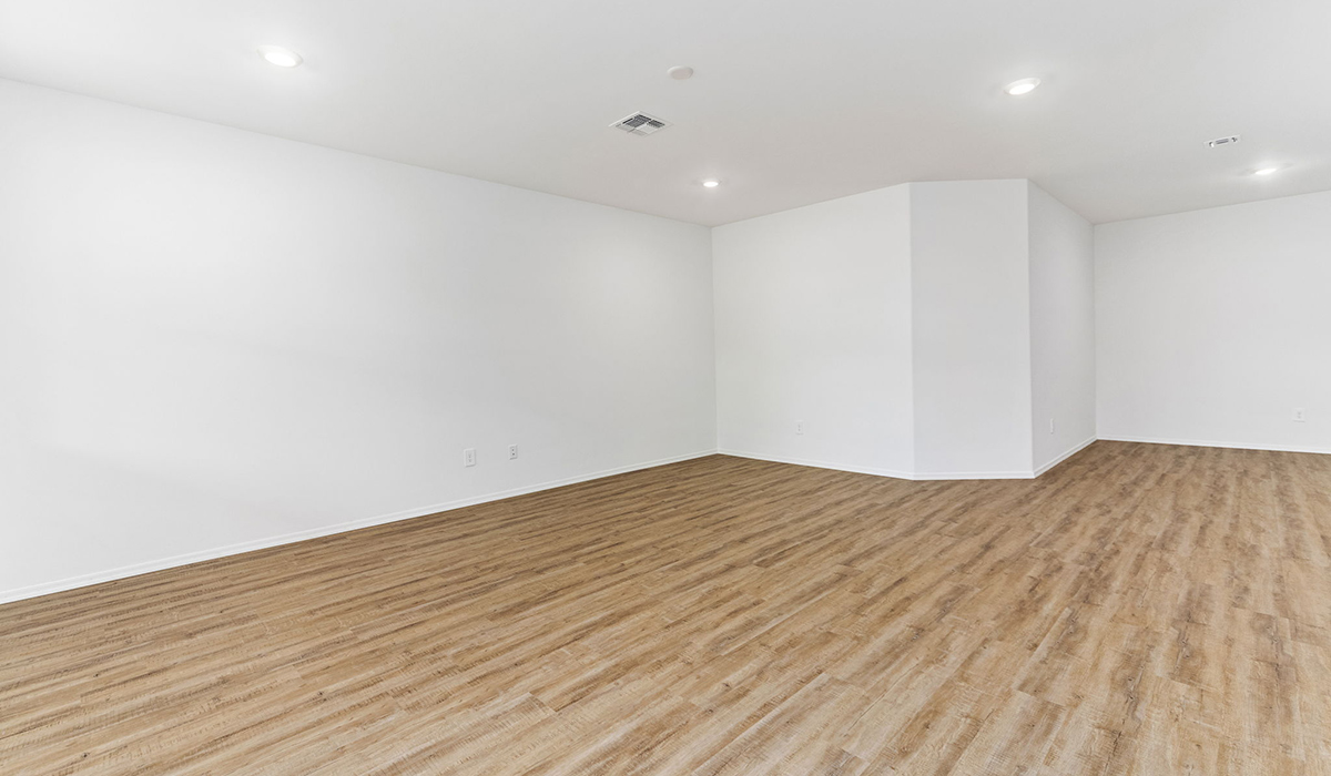 Discover the Dalea at Hanson Ridge in Vail, Arizona - a beautifully designed single-story home that perfectly balances comfort and elegance. This thoughtfully crafted floor plan offers two spacious layout options: a 2,058 sq. ft. home featuring four bedrooms and a 3-car tandem garage, or a 2,224 sq. ft. layout with five bedrooms and a two-car garage. Whether you're looking for extra space or a more open layout, the Dalea is designed to suit your lifestyle with style and functionality in every detail.  As you enter through the inviting front porch, you're welcomed into a bright and airy living space that flows seamlessly into the great room, dining area, and kitchen. This open-concept design is perfect for both family gatherings and entertaining. The kitchen features Quartz countertops, Shaker Style Cabinetry, modern appliances, and a convenient pantry, making meal preparation a breeze.  The primary suite, located at the rear of the home, providing a private retreat with a spacious a large walk-in closet, and en-suite bathroom featuring dual vanities and a walk-in shower. This suite offers a peaceful escape, ideal for relaxation. This thoughtfully designed four to five-bedroom home offers privacy and comfort with three bathrooms. The Dalea plan also includes a utility room and two-car garage with the option of three-car garage.   Living at Hanson Ridge means more than just having a beautiful home. The community offers a peaceful lifestyle with incredible desert landscapes, mountain views, and easy access to I-10 for convenient commutes to Tucson and surrounding areas. Designed with energy efficiency in mind, The Dalea at Hanson Ridge meets Zero Energy Ready Home standards, ensuring sustainability and long-term savings.  Experience the charm and comfort of The Dalea at Hanson Ridge, where modern convenience meets the beauty of Arizona’s desert landscape.