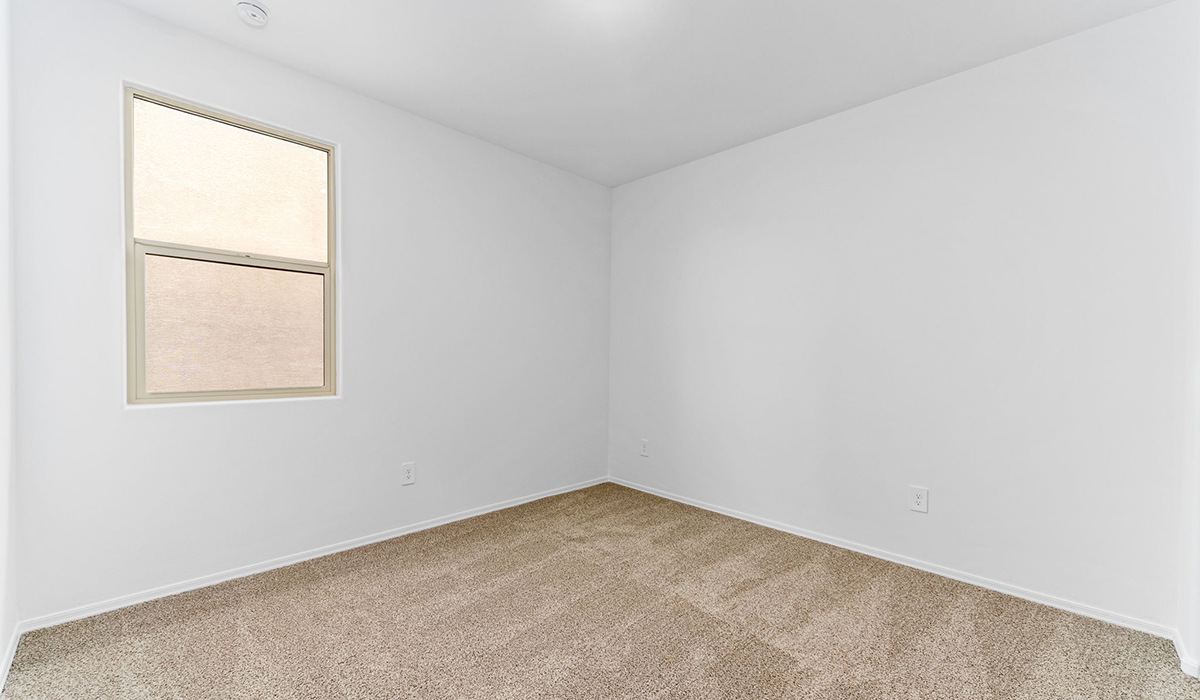 Discover the Dalea at Hanson Ridge in Vail, Arizona - a beautifully designed single-story home that perfectly balances comfort and elegance. This thoughtfully crafted floor plan offers two spacious layout options: a 2,058 sq. ft. home featuring four bedrooms and a 3-car tandem garage, or a 2,224 sq. ft. layout with five bedrooms and a two-car garage. Whether you're looking for extra space or a more open layout, the Dalea is designed to suit your lifestyle with style and functionality in every detail.  As you enter through the inviting front porch, you're welcomed into a bright and airy living space that flows seamlessly into the great room, dining area, and kitchen. This open-concept design is perfect for both family gatherings and entertaining. The kitchen features Quartz countertops, Shaker Style Cabinetry, modern appliances, and a convenient pantry, making meal preparation a breeze.  The primary suite, located at the rear of the home, providing a private retreat with a spacious a large walk-in closet, and en-suite bathroom featuring dual vanities and a walk-in shower. This suite offers a peaceful escape, ideal for relaxation. This thoughtfully designed four to five-bedroom home offers privacy and comfort with three bathrooms. The Dalea plan also includes a utility room and two-car garage with the option of three-car garage.   Living at Hanson Ridge means more than just having a beautiful home. The community offers a peaceful lifestyle with incredible desert landscapes, mountain views, and easy access to I-10 for convenient commutes to Tucson and surrounding areas. Designed with energy efficiency in mind, The Dalea at Hanson Ridge meets Zero Energy Ready Home standards, ensuring sustainability and long-term savings.  Experience the charm and comfort of The Dalea at Hanson Ridge, where modern convenience meets the beauty of Arizona’s desert landscape.