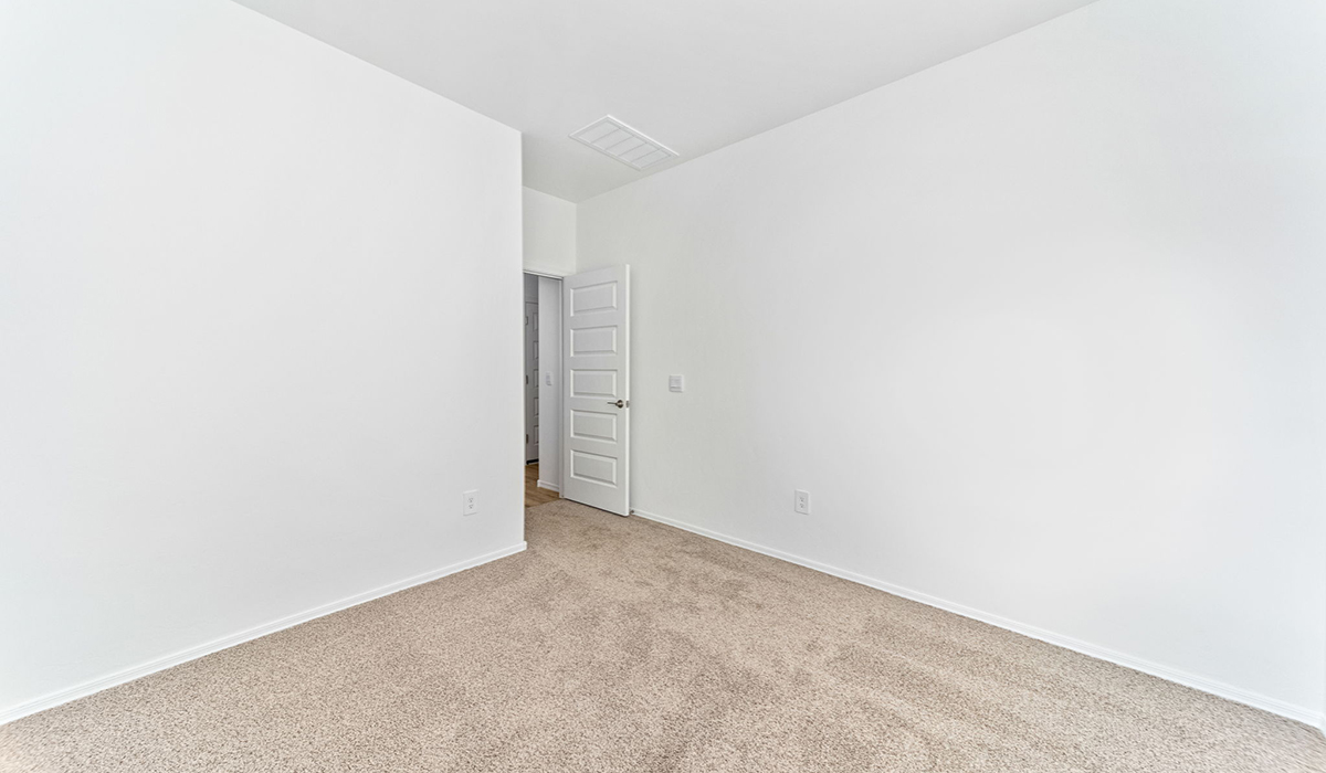 Discover the Dalea at Hanson Ridge in Vail, Arizona - a beautifully designed single-story home that perfectly balances comfort and elegance. This thoughtfully crafted floor plan offers two spacious layout options: a 2,058 sq. ft. home featuring four bedrooms and a 3-car tandem garage, or a 2,224 sq. ft. layout with five bedrooms and a two-car garage. Whether you're looking for extra space or a more open layout, the Dalea is designed to suit your lifestyle with style and functionality in every detail.  As you enter through the inviting front porch, you're welcomed into a bright and airy living space that flows seamlessly into the great room, dining area, and kitchen. This open-concept design is perfect for both family gatherings and entertaining. The kitchen features Quartz countertops, Shaker Style Cabinetry, modern appliances, and a convenient pantry, making meal preparation a breeze.  The primary suite, located at the rear of the home, providing a private retreat with a spacious a large walk-in closet, and en-suite bathroom featuring dual vanities and a walk-in shower. This suite offers a peaceful escape, ideal for relaxation. This thoughtfully designed four to five-bedroom home offers privacy and comfort with three bathrooms. The Dalea plan also includes a utility room and two-car garage with the option of three-car garage.   Living at Hanson Ridge means more than just having a beautiful home. The community offers a peaceful lifestyle with incredible desert landscapes, mountain views, and easy access to I-10 for convenient commutes to Tucson and surrounding areas. Designed with energy efficiency in mind, The Dalea at Hanson Ridge meets Zero Energy Ready Home standards, ensuring sustainability and long-term savings.  Experience the charm and comfort of The Dalea at Hanson Ridge, where modern convenience meets the beauty of Arizona’s desert landscape.