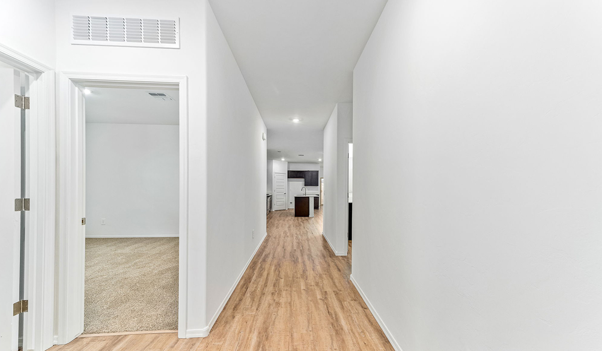 Discover the Dalea at Hanson Ridge in Vail, Arizona - a beautifully designed single-story home that perfectly balances comfort and elegance. This thoughtfully crafted floor plan offers two spacious layout options: a 2,058 sq. ft. home featuring four bedrooms and a 3-car tandem garage, or a 2,224 sq. ft. layout with five bedrooms and a two-car garage. Whether you're looking for extra space or a more open layout, the Dalea is designed to suit your lifestyle with style and functionality in every detail.  As you enter through the inviting front porch, you're welcomed into a bright and airy living space that flows seamlessly into the great room, dining area, and kitchen. This open-concept design is perfect for both family gatherings and entertaining. The kitchen features Quartz countertops, Shaker Style Cabinetry, modern appliances, and a convenient pantry, making meal preparation a breeze.  The primary suite, located at the rear of the home, providing a private retreat with a spacious a large walk-in closet, and en-suite bathroom featuring dual vanities and a walk-in shower. This suite offers a peaceful escape, ideal for relaxation. This thoughtfully designed four to five-bedroom home offers privacy and comfort with three bathrooms. The Dalea plan also includes a utility room and two-car garage with the option of three-car garage.   Living at Hanson Ridge means more than just having a beautiful home. The community offers a peaceful lifestyle with incredible desert landscapes, mountain views, and easy access to I-10 for convenient commutes to Tucson and surrounding areas. Designed with energy efficiency in mind, The Dalea at Hanson Ridge meets Zero Energy Ready Home standards, ensuring sustainability and long-term savings.  Experience the charm and comfort of The Dalea at Hanson Ridge, where modern convenience meets the beauty of Arizona’s desert landscape.