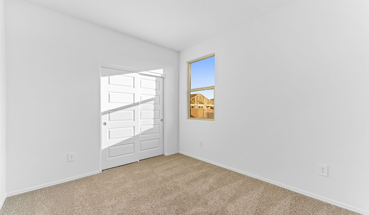 Discover the Dalea at Hanson Ridge in Vail, Arizona - a beautifully designed single-story home that perfectly balances comfort and elegance. This thoughtfully crafted floor plan offers two spacious layout options: a 2,058 sq. ft. home featuring four bedrooms and a 3-car tandem garage, or a 2,224 sq. ft. layout with five bedrooms and a two-car garage. Whether you're looking for extra space or a more open layout, the Dalea is designed to suit your lifestyle with style and functionality in every detail.  As you enter through the inviting front porch, you're welcomed into a bright and airy living space that flows seamlessly into the great room, dining area, and kitchen. This open-concept design is perfect for both family gatherings and entertaining. The kitchen features Quartz countertops, Shaker Style Cabinetry, modern appliances, and a convenient pantry, making meal preparation a breeze.  The primary suite, located at the rear of the home, providing a private retreat with a spacious a large walk-in closet, and en-suite bathroom featuring dual vanities and a walk-in shower. This suite offers a peaceful escape, ideal for relaxation. This thoughtfully designed four to five-bedroom home offers privacy and comfort with three bathrooms. The Dalea plan also includes a utility room and two-car garage with the option of three-car garage.   Living at Hanson Ridge means more than just having a beautiful home. The community offers a peaceful lifestyle with incredible desert landscapes, mountain views, and easy access to I-10 for convenient commutes to Tucson and surrounding areas. Designed with energy efficiency in mind, The Dalea at Hanson Ridge meets Zero Energy Ready Home standards, ensuring sustainability and long-term savings.  Experience the charm and comfort of The Dalea at Hanson Ridge, where modern convenience meets the beauty of Arizona’s desert landscape.