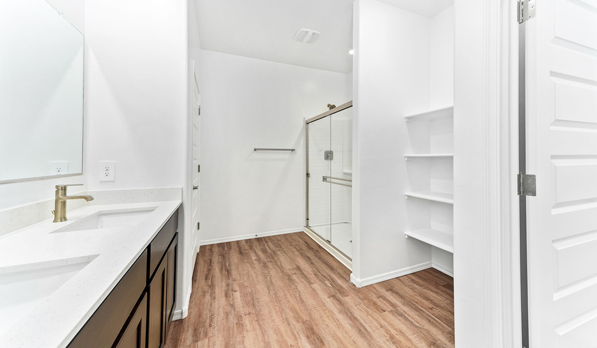 Discover the Dalea at Hanson Ridge in Vail, Arizona - a beautifully designed single-story home that perfectly balances comfort and elegance. This thoughtfully crafted floor plan offers two spacious layout options: a 2,058 sq. ft. home featuring four bedrooms and a 3-car tandem garage, or a 2,224 sq. ft. layout with five bedrooms and a two-car garage. Whether you're looking for extra space or a more open layout, the Dalea is designed to suit your lifestyle with style and functionality in every detail.  As you enter through the inviting front porch, you're welcomed into a bright and airy living space that flows seamlessly into the great room, dining area, and kitchen. This open-concept design is perfect for both family gatherings and entertaining. The kitchen features Quartz countertops, Shaker Style Cabinetry, modern appliances, and a convenient pantry, making meal preparation a breeze.  The primary suite, located at the rear of the home, providing a private retreat with a spacious a large walk-in closet, and en-suite bathroom featuring dual vanities and a walk-in shower. This suite offers a peaceful escape, ideal for relaxation. This thoughtfully designed four to five-bedroom home offers privacy and comfort with three bathrooms. The Dalea plan also includes a utility room and two-car garage with the option of three-car garage.   Living at Hanson Ridge means more than just having a beautiful home. The community offers a peaceful lifestyle with incredible desert landscapes, mountain views, and easy access to I-10 for convenient commutes to Tucson and surrounding areas. Designed with energy efficiency in mind, The Dalea at Hanson Ridge meets Zero Energy Ready Home standards, ensuring sustainability and long-term savings.  Experience the charm and comfort of The Dalea at Hanson Ridge, where modern convenience meets the beauty of Arizona’s desert landscape.