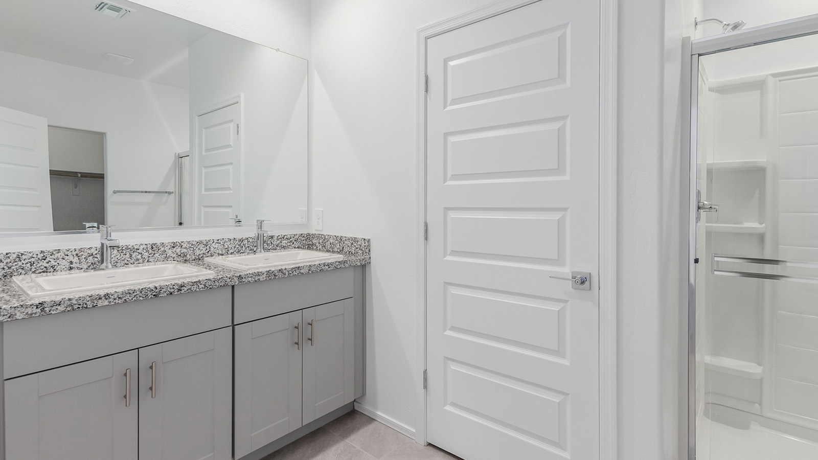 Step into The Diana at Hanson Ridge in Vail, Arizona – a thoughtfully crafted 1,558 sq. ft. single-story new home designed to offer a perfect harmony of comfort and desert elegance.  As you enter through the inviting front porch, you're welcomed into a bright and airy living space that flows seamlessly into the great room, dining area, and kitchen. This open-concept design is perfect for both casual family living and entertaining. The kitchen, with its granite countertops, modern appliances, and a convenient pantry.  The primary suite, located at the rear of the home, provides a private retreat with a spacious bedroom, a large walk-in closet, and an ensuite bathroom. Two additional bedrooms are thoughtfully placed to provide privacy and comfort, sharing a well-appointed full bathroom. The home also includes a utility room for added convenience and direct access to a two-car garage, making daily tasks efficient and easy.  Step outside from the great room to the covered patio, where you can enjoy Arizona’s beautiful weather year-round. Whether you're savoring a quiet morning or hosting an evening gathering, this outdoor space extends your living area into the tranquil surroundings of Hanson Ridge.  Living at Hanson Ridge means more than just having a beautiful home. The community offers a peaceful lifestyle with incredible desert landscapes, mountain views, and easy access to I-10 for convenient commutes to Tucson and surrounding areas. Designed with energy efficiency in mind, The Diana at Hanson Ridge meets DOE Zero Energy Ready Home standards, ensuring sustainability and long-term savings.  Experience the charm and comfort of The Diana at Hanson Ridge, where modern convenience meets the beauty of Arizona’s desert landscape.  *Images shown are for reference only. They depict a virtual staged Diana model home and may not represent the actual home.