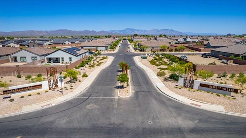Welcome to Barnett Village, a vibrant new home community nestled in the growing town of Marana, Arizona, just northwest of Tucson. Located off Tangerine Road, this community offers a serene desert lifestyle with modern conveniences. Choose from a variety of thoughtfully designed single-family homes that feature up to five bedrooms, spacious open-concept living areas, and energy-efficient features, including DOE Zero Energy Ready Home certification, ensuring both sustainability and savings. Barnett Village stands out with its range of family-friendly amenities, including a playground, a half basketball court, ramadas, BBQ areas, and extensive walking trails. Enjoy the lush green spaces and gather with friends and family in beautifully landscaped parks. The community is just a short drive from major outdoor attractions such as Catalina State Park, Picacho Peak State Park, and Saguaro National Park, offering endless opportunities for hiking, cycling, and wildlife viewing. Residents of Barnett Village benefit from its proximity to excellent schools in the Marana Unified School District and easy access to shopping, dining, and recreation. The upcoming community pool in Marana, along with nearby attractions like the Marana Pumpkin Patch, Tucson Premium Outlets, and Heritage River Park, further enhance the lifestyle offered here. The homes at Barnett Village are designed with comfort and convenience in mind, featuring granite countertops, spacious walk-in closets, dual vanities in master baths, and smart home technology. With its blend of modern amenities, scenic beauty, and convenient location, Barnett Village is the perfect place to call home. Explore Barnett Village today and discover a community where you can truly thrive.