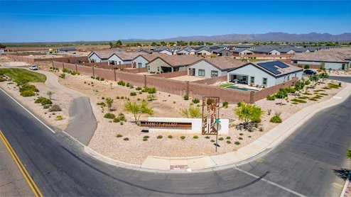 Welcome to Barnett Village, a vibrant new home community nestled in the growing town of Marana, Arizona, just northwest of Tucson. Located off Tangerine Road, this community offers a serene desert lifestyle with modern conveniences. Choose from a variety of thoughtfully designed single-family homes that feature up to five bedrooms, spacious open-concept living areas, and energy-efficient features, including DOE Zero Energy Ready Home certification, ensuring both sustainability and savings. Barnett Village stands out with its range of family-friendly amenities, including a playground, a half basketball court, ramadas, BBQ areas, and extensive walking trails. Enjoy the lush green spaces and gather with friends and family in beautifully landscaped parks. The community is just a short drive from major outdoor attractions such as Catalina State Park, Picacho Peak State Park, and Saguaro National Park, offering endless opportunities for hiking, cycling, and wildlife viewing. Residents of Barnett Village benefit from its proximity to excellent schools in the Marana Unified School District and easy access to shopping, dining, and recreation. The upcoming community pool in Marana, along with nearby attractions like the Marana Pumpkin Patch, Tucson Premium Outlets, and Heritage River Park, further enhance the lifestyle offered here. The homes at Barnett Village are designed with comfort and convenience in mind, featuring granite countertops, spacious walk-in closets, dual vanities in master baths, and smart home technology. With its blend of modern amenities, scenic beauty, and convenient location, Barnett Village is the perfect place to call home. Explore Barnett Village today and discover a community where you can truly thrive.