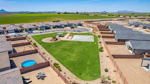 Welcome to Barnett Village, a vibrant new home community nestled in the growing town of Marana, Arizona, just northwest of Tucson. Located off Tangerine Road, this community offers a serene desert lifestyle with modern conveniences. Choose from a variety of thoughtfully designed single-family homes that feature up to five bedrooms, spacious open-concept living areas, and energy-efficient features, including DOE Zero Energy Ready Home certification, ensuring both sustainability and savings. Barnett Village stands out with its range of family-friendly amenities, including a playground, a half basketball court, ramadas, BBQ areas, and extensive walking trails. Enjoy the lush green spaces and gather with friends and family in beautifully landscaped parks. The community is just a short drive from major outdoor attractions such as Catalina State Park, Picacho Peak State Park, and Saguaro National Park, offering endless opportunities for hiking, cycling, and wildlife viewing. Residents of Barnett Village benefit from its proximity to excellent schools in the Marana Unified School District and easy access to shopping, dining, and recreation. The upcoming community pool in Marana, along with nearby attractions like the Marana Pumpkin Patch, Tucson Premium Outlets, and Heritage River Park, further enhance the lifestyle offered here. The homes at Barnett Village are designed with comfort and convenience in mind, featuring granite countertops, spacious walk-in closets, dual vanities in master baths, and smart home technology. With its blend of modern amenities, scenic beauty, and convenient location, Barnett Village is the perfect place to call home. Explore Barnett Village today and discover a community where you can truly thrive.