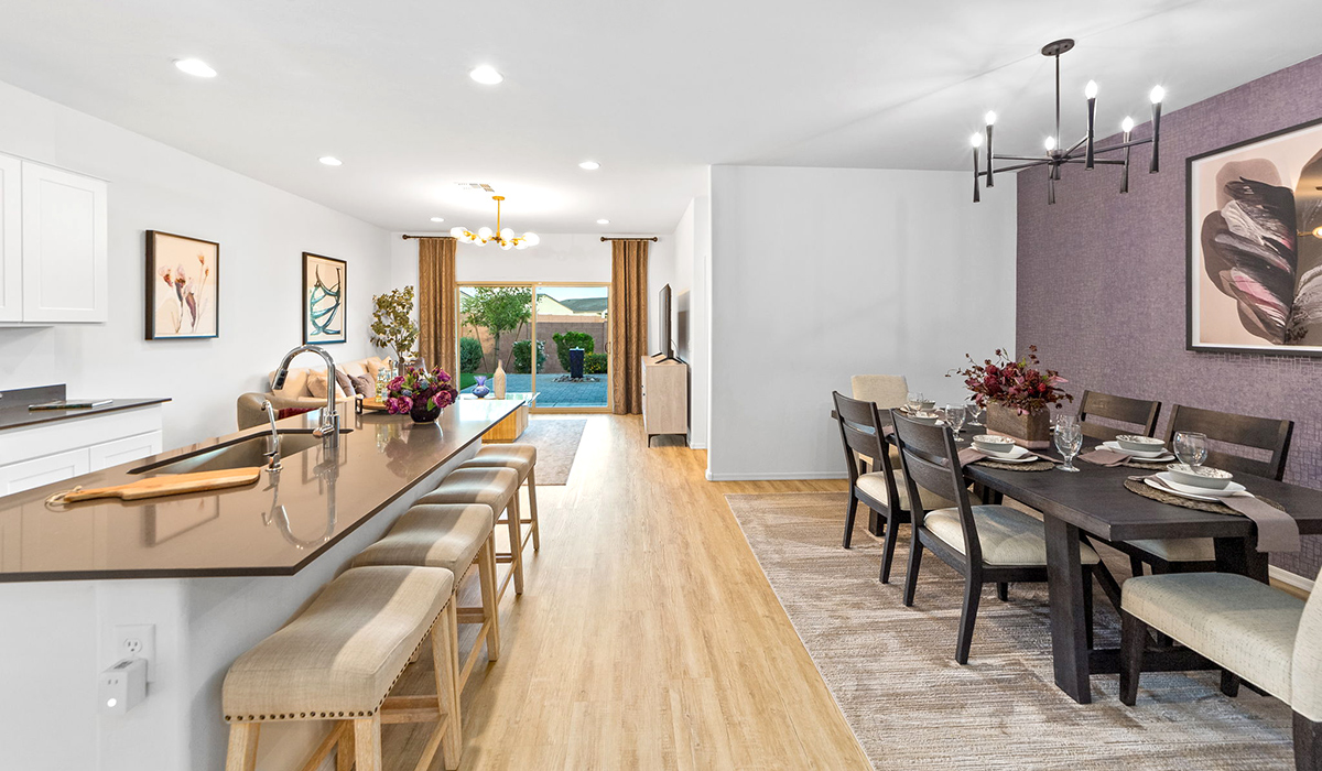 Welcome to Barnett Village, a vibrant new home community nestled in the growing town of Marana, Arizona, just northwest of Tucson. Located off Tangerine Road, this community offers a serene desert lifestyle with modern conveniences. Choose from a variety of thoughtfully designed single-family homes that feature up to five bedrooms, spacious open-concept living areas, and energy-efficient features, including DOE Zero Energy Ready Home certification, ensuring both sustainability and savings.  Barnett Village stands out with its range of family-friendly amenities, including a playground, a half basketball court, ramadas, BBQ areas, and extensive walking trails. Enjoy the lush green spaces and gather with friends and family in beautifully landscaped parks. The community is just a short drive from major outdoor attractions such as Catalina State Park, Picacho Peak State Park, and Saguaro National Park, offering endless opportunities for hiking, cycling, and wildlife viewing.  Residents of Barnett Village benefit from its proximity to excellent schools in the Marana Unified School District and easy access to shopping, dining, and recreation. The upcoming community pool in Marana, along with nearby attractions like the Marana Pumpkin Patch, Tucson Premium Outlets, and Heritage River Park, further enhance the lifestyle offered here.  The homes at Barnett Village are designed with comfort and convenience in mind, featuring granite countertops, spacious walk-in closets, dual vanities in master baths, and smart home technology. With its blend of modern amenities, scenic beauty, and convenient location, Barnett Village is the perfect place to call home.  Explore Barnett Village today and discover a community where you can truly thrive.