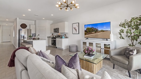 Welcome to Barnett Village, a vibrant new home community nestled in the growing town of Marana, Arizona, just northwest of Tucson. Located off Tangerine Road, this community offers a serene desert lifestyle with modern conveniences. Choose from a variety of thoughtfully designed single-family homes that feature up to five bedrooms, spacious open-concept living areas, and energy-efficient features, including DOE Zero Energy Ready Home certification, ensuring both sustainability and savings. Barnett Village stands out with its range of family-friendly amenities, including a playground, a half basketball court, ramadas, BBQ areas, and extensive walking trails. Enjoy the lush green spaces and gather with friends and family in beautifully landscaped parks. The community is just a short drive from major outdoor attractions such as Catalina State Park, Picacho Peak State Park, and Saguaro National Park, offering endless opportunities for hiking, cycling, and wildlife viewing. Residents of Barnett Village benefit from its proximity to excellent schools in the Marana Unified School District and easy access to shopping, dining, and recreation. The upcoming community pool in Marana, along with nearby attractions like the Marana Pumpkin Patch, Tucson Premium Outlets, and Heritage River Park, further enhance the lifestyle offered here. The homes at Barnett Village are designed with comfort and convenience in mind, featuring granite countertops, spacious walk-in closets, dual vanities in master baths, and smart home technology. With its blend of modern amenities, scenic beauty, and convenient location, Barnett Village is the perfect place to call home. Explore Barnett Village today and discover a community where you can truly thrive.