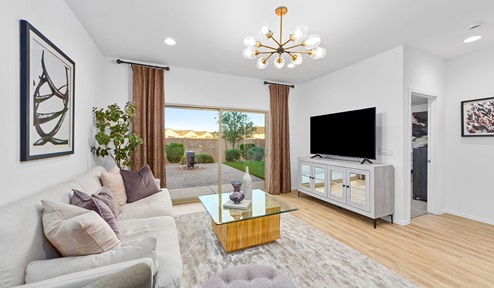 Welcome to Barnett Village, a vibrant new home community nestled in the growing town of Marana, Arizona, just northwest of Tucson. Located off Tangerine Road, this community offers a serene desert lifestyle with modern conveniences. Choose from a variety of thoughtfully designed single-family homes that feature up to five bedrooms, spacious open-concept living areas, and energy-efficient features, including DOE Zero Energy Ready Home certification, ensuring both sustainability and savings. Barnett Village stands out with its range of family-friendly amenities, including a playground, a half basketball court, ramadas, BBQ areas, and extensive walking trails. Enjoy the lush green spaces and gather with friends and family in beautifully landscaped parks. The community is just a short drive from major outdoor attractions such as Catalina State Park, Picacho Peak State Park, and Saguaro National Park, offering endless opportunities for hiking, cycling, and wildlife viewing. Residents of Barnett Village benefit from its proximity to excellent schools in the Marana Unified School District and easy access to shopping, dining, and recreation. The upcoming community pool in Marana, along with nearby attractions like the Marana Pumpkin Patch, Tucson Premium Outlets, and Heritage River Park, further enhance the lifestyle offered here. The homes at Barnett Village are designed with comfort and convenience in mind, featuring granite countertops, spacious walk-in closets, dual vanities in master baths, and smart home technology. With its blend of modern amenities, scenic beauty, and convenient location, Barnett Village is the perfect place to call home. Explore Barnett Village today and discover a community where you can truly thrive.