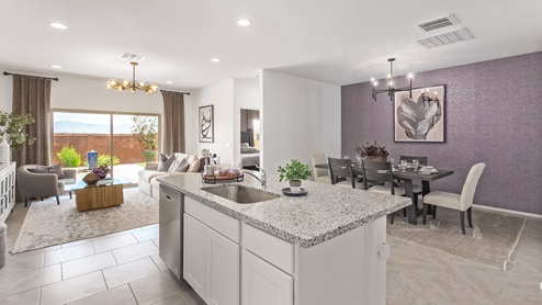 Welcome to Barnett Village, a vibrant new home community nestled in the growing town of Marana, Arizona, just northwest of Tucson. Located off Tangerine Road, this community offers a serene desert lifestyle with modern conveniences. Choose from a variety of thoughtfully designed single-family homes that feature up to five bedrooms, spacious open-concept living areas, and energy-efficient features, including DOE Zero Energy Ready Home certification, ensuring both sustainability and savings. Barnett Village stands out with its range of family-friendly amenities, including a playground, a half basketball court, ramadas, BBQ areas, and extensive walking trails. Enjoy the lush green spaces and gather with friends and family in beautifully landscaped parks. The community is just a short drive from major outdoor attractions such as Catalina State Park, Picacho Peak State Park, and Saguaro National Park, offering endless opportunities for hiking, cycling, and wildlife viewing. Residents of Barnett Village benefit from its proximity to excellent schools in the Marana Unified School District and easy access to shopping, dining, and recreation. The upcoming community pool in Marana, along with nearby attractions like the Marana Pumpkin Patch, Tucson Premium Outlets, and Heritage River Park, further enhance the lifestyle offered here. The homes at Barnett Village are designed with comfort and convenience in mind, featuring granite countertops, spacious walk-in closets, dual vanities in master baths, and smart home technology. With its blend of modern amenities, scenic beauty, and convenient location, Barnett Village is the perfect place to call home. Explore Barnett Village today and discover a community where you can truly thrive.