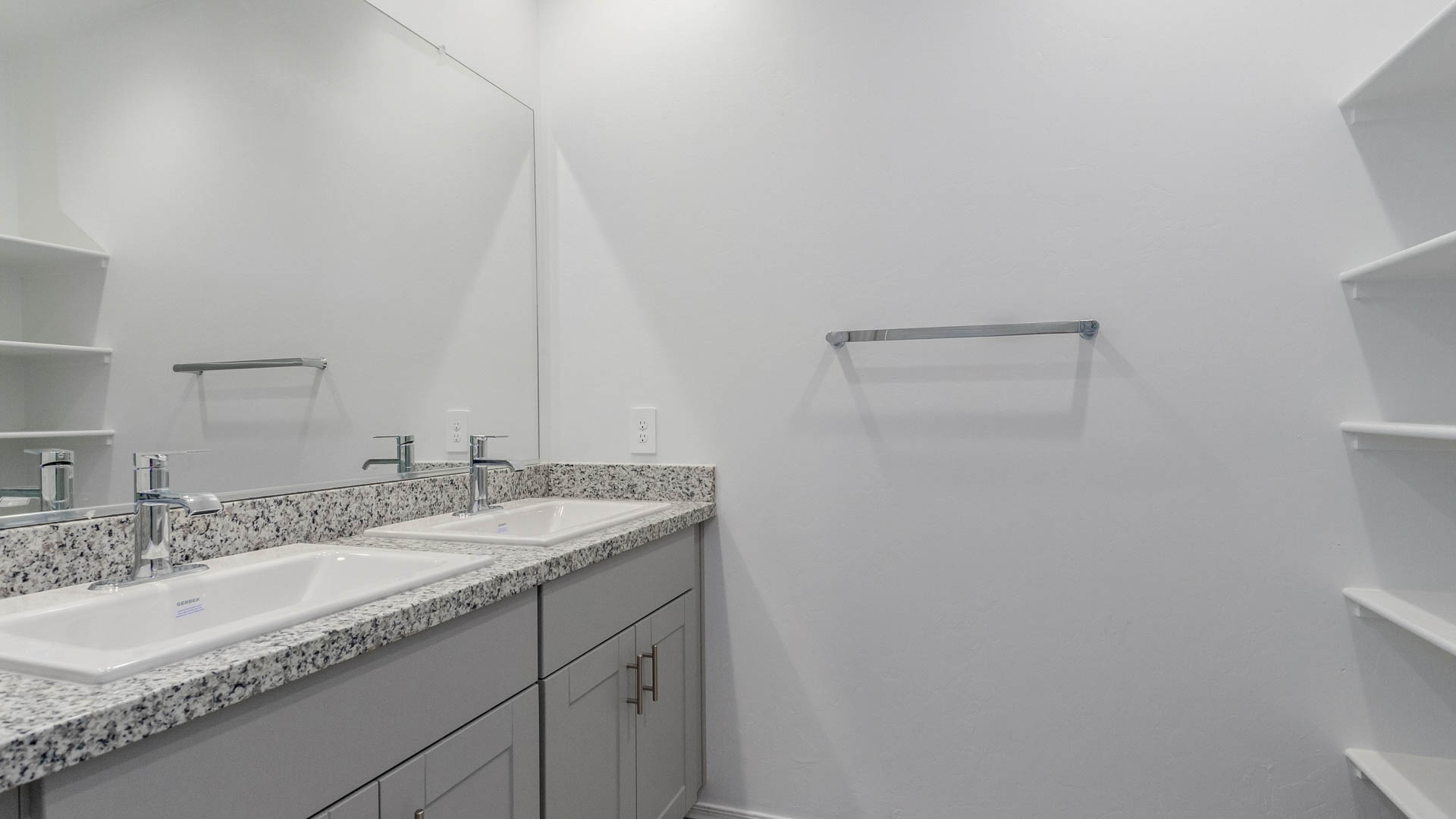 Welcome to The Parker at Barnett Village in Marana, Arizona – a stunning 1,909 sq. ft. single-story new home that combines space, comfort, and modern design for today’s growing families.  As you step through the inviting front porch and into the entryway, you’re immediately greeted by a well-thought-out floorplan that offers ample space for everyone. Just off the entry, Bedroom 5 is ideally situated for guests or as a private home office, complete with easy access to a full bathroom.  Moving further into the home, the spacious great room serves as the heart of The Parker. This open-concept area connects seamlessly to the dining room and kitchen, creating a perfect setting for both family gatherings and everyday living. The kitchen is a chef’s delight, featuring sleek granite countertops, modern appliances, a large island with a breakfast bar, and a walk-in pantry that ensures plenty of storage space.  Down a private hallway, you’ll discover the luxurious master suite. This spacious bedroom offers a serene retreat within the home, complete with a large walk-in closet and an en-suite bathroom featuring dual vanities and a walk-in shower. Three additional bedrooms are located nearby, sharing access to a full bathroom, making it easy to accommodate family and guests alike.  The Parker also includes a utility room conveniently located near the bedrooms, and a two-car garage that offers both storage and functionality.  Step outside from the great room to the covered patio – an ideal spot for enjoying Arizona’s beautiful weather year-round. Whether you’re hosting a barbecue or simply relaxing with a book, this outdoor space extends your living area into the serene surroundings of Barnett Village.  Designed with energy efficiency in mind, The Parker at Barnett Village is DOE Zero Energy Ready Home certified, ensuring a sustainable and cost-effective living environment.