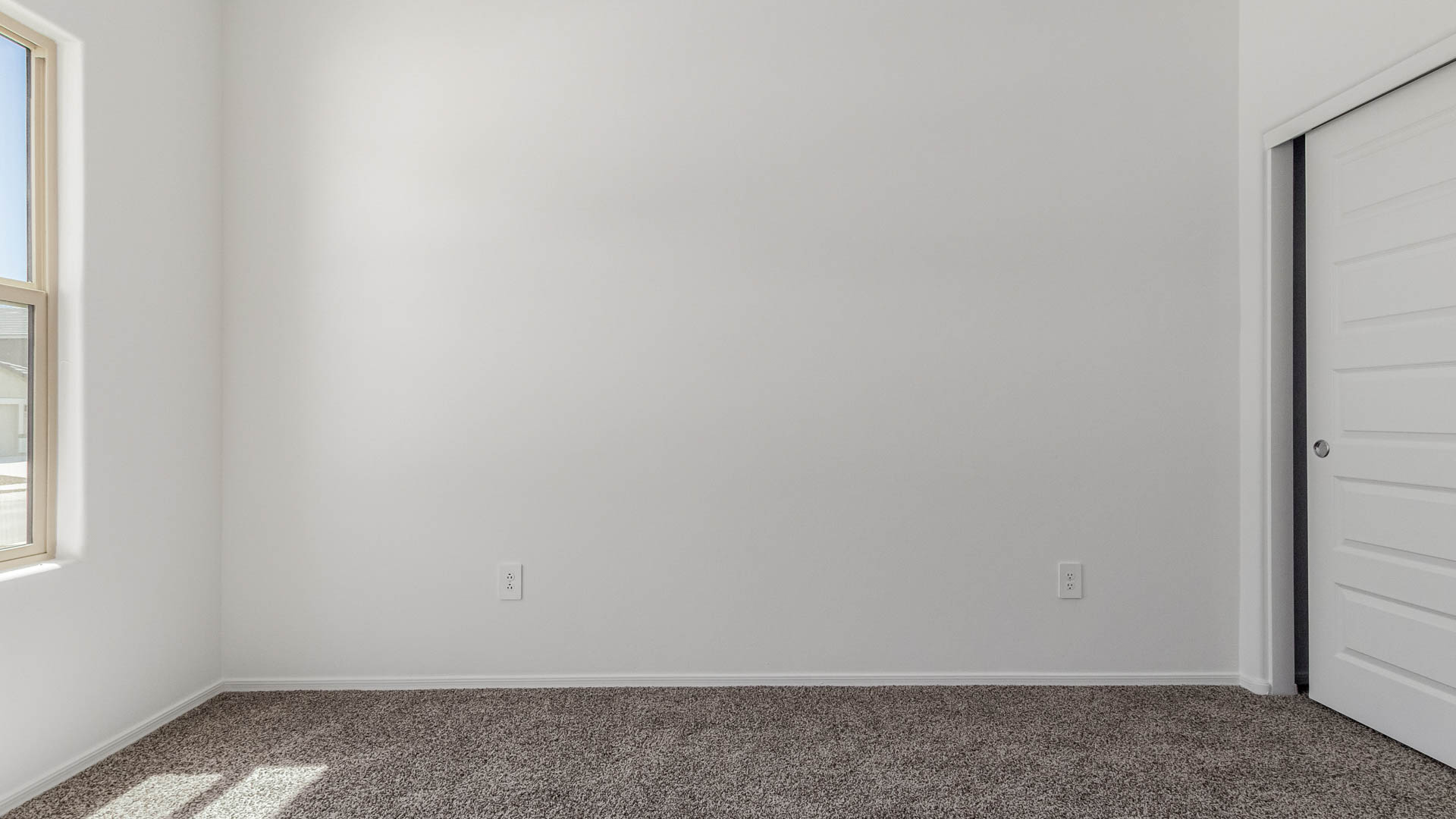 Welcome to The Parker at Barnett Village in Marana, Arizona – a stunning 1,909 sq. ft. single-story new home that combines space, comfort, and modern design for today’s growing families.  As you step through the inviting front porch and into the entryway, you’re immediately greeted by a well-thought-out floorplan that offers ample space for everyone. Just off the entry, Bedroom 5 is ideally situated for guests or as a private home office, complete with easy access to a full bathroom.  Moving further into the home, the spacious great room serves as the heart of The Parker. This open-concept area connects seamlessly to the dining room and kitchen, creating a perfect setting for both family gatherings and everyday living. The kitchen is a chef’s delight, featuring sleek granite countertops, modern appliances, a large island with a breakfast bar, and a walk-in pantry that ensures plenty of storage space.  Down a private hallway, you’ll discover the luxurious master suite. This spacious bedroom offers a serene retreat within the home, complete with a large walk-in closet and an en-suite bathroom featuring dual vanities and a walk-in shower. Three additional bedrooms are located nearby, sharing access to a full bathroom, making it easy to accommodate family and guests alike.  The Parker also includes a utility room conveniently located near the bedrooms, and a two-car garage that offers both storage and functionality.  Step outside from the great room to the covered patio – an ideal spot for enjoying Arizona’s beautiful weather year-round. Whether you’re hosting a barbecue or simply relaxing with a book, this outdoor space extends your living area into the serene surroundings of Barnett Village.  Designed with energy efficiency in mind, The Parker at Barnett Village is DOE Zero Energy Ready Home certified, ensuring a sustainable and cost-effective living environment.