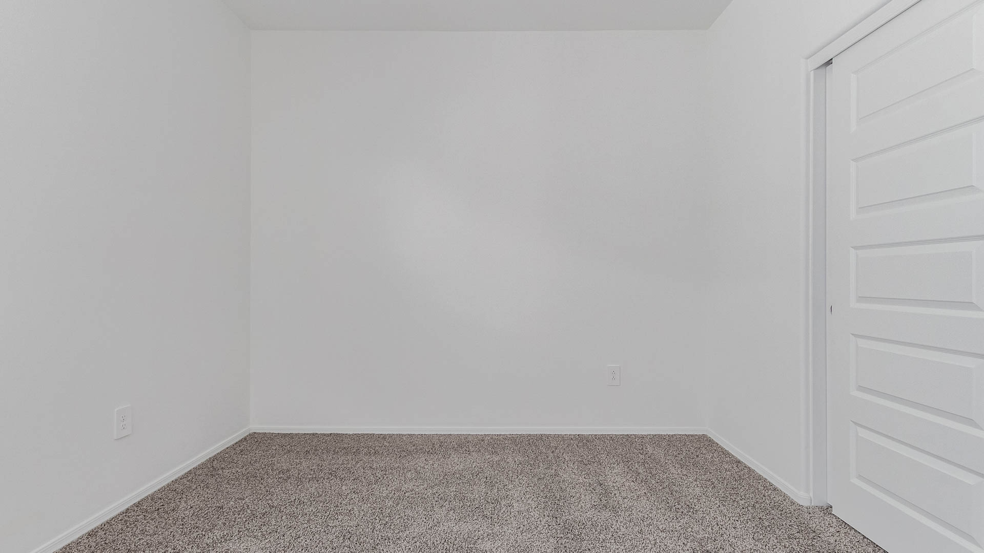 Welcome to The Parker at Barnett Village in Marana, Arizona – a stunning 1,909 sq. ft. single-story new home that combines space, comfort, and modern design for today’s growing families.  As you step through the inviting front porch and into the entryway, you’re immediately greeted by a well-thought-out floorplan that offers ample space for everyone. Just off the entry, Bedroom 5 is ideally situated for guests or as a private home office, complete with easy access to a full bathroom.  Moving further into the home, the spacious great room serves as the heart of The Parker. This open-concept area connects seamlessly to the dining room and kitchen, creating a perfect setting for both family gatherings and everyday living. The kitchen is a chef’s delight, featuring sleek granite countertops, modern appliances, a large island with a breakfast bar, and a walk-in pantry that ensures plenty of storage space.  Down a private hallway, you’ll discover the luxurious master suite. This spacious bedroom offers a serene retreat within the home, complete with a large walk-in closet and an en-suite bathroom featuring dual vanities and a walk-in shower. Three additional bedrooms are located nearby, sharing access to a full bathroom, making it easy to accommodate family and guests alike.  The Parker also includes a utility room conveniently located near the bedrooms, and a two-car garage that offers both storage and functionality.  Step outside from the great room to the covered patio – an ideal spot for enjoying Arizona’s beautiful weather year-round. Whether you’re hosting a barbecue or simply relaxing with a book, this outdoor space extends your living area into the serene surroundings of Barnett Village.  Designed with energy efficiency in mind, The Parker at Barnett Village is DOE Zero Energy Ready Home certified, ensuring a sustainable and cost-effective living environment.