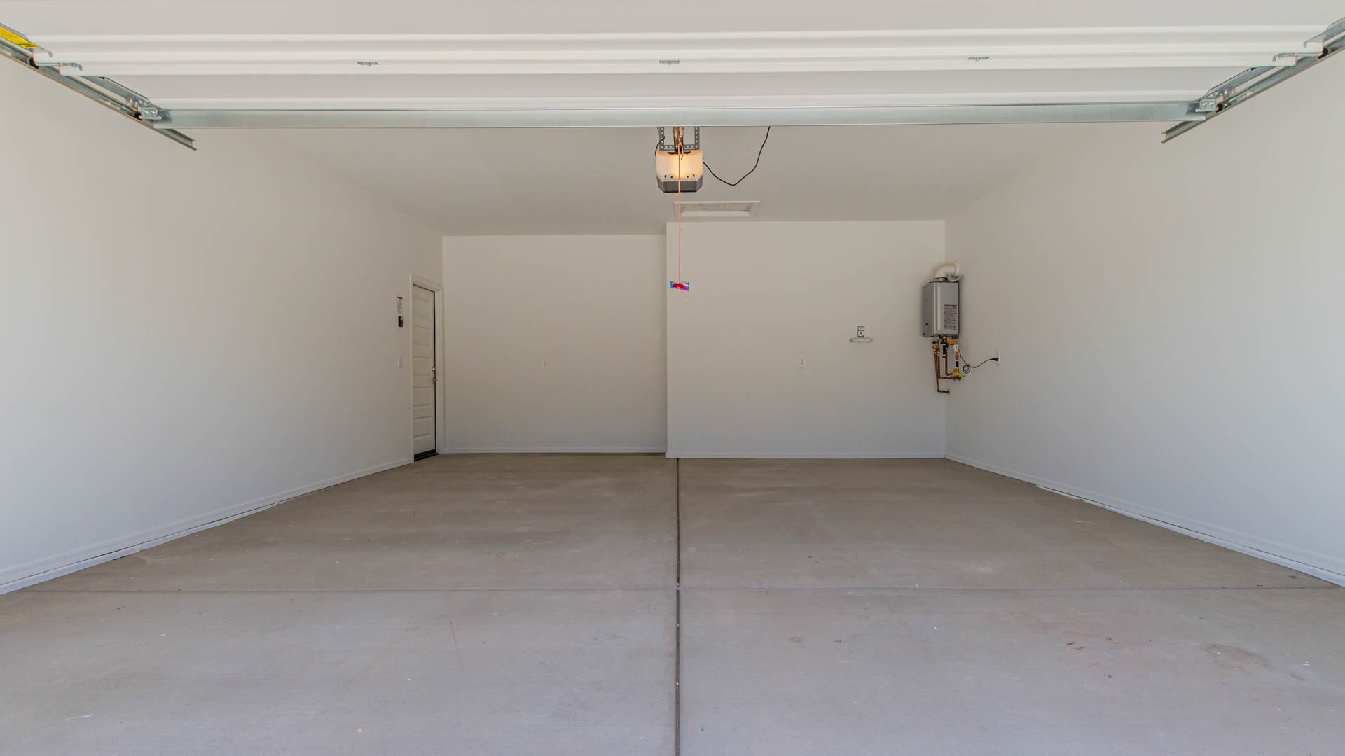 Welcome to The Parker at Barnett Village in Marana, Arizona – a stunning 1,909 sq. ft. single-story new home that combines space, comfort, and modern design for today’s growing families.  As you step through the inviting front porch and into the entryway, you’re immediately greeted by a well-thought-out floorplan that offers ample space for everyone. Just off the entry, Bedroom 5 is ideally situated for guests or as a private home office, complete with easy access to a full bathroom.  Moving further into the home, the spacious great room serves as the heart of The Parker. This open-concept area connects seamlessly to the dining room and kitchen, creating a perfect setting for both family gatherings and everyday living. The kitchen is a chef’s delight, featuring sleek granite countertops, modern appliances, a large island with a breakfast bar, and a walk-in pantry that ensures plenty of storage space.  Down a private hallway, you’ll discover the luxurious master suite. This spacious bedroom offers a serene retreat within the home, complete with a large walk-in closet and an en-suite bathroom featuring dual vanities and a walk-in shower. Three additional bedrooms are located nearby, sharing access to a full bathroom, making it easy to accommodate family and guests alike.  The Parker also includes a utility room conveniently located near the bedrooms, and a two-car garage that offers both storage and functionality.  Step outside from the great room to the covered patio – an ideal spot for enjoying Arizona’s beautiful weather year-round. Whether you’re hosting a barbecue or simply relaxing with a book, this outdoor space extends your living area into the serene surroundings of Barnett Village.  Designed with energy efficiency in mind, The Parker at Barnett Village is DOE Zero Energy Ready Home certified, ensuring a sustainable and cost-effective living environment.