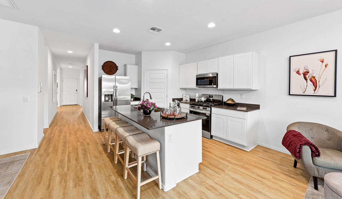 Welcome to Barnett Village, a vibrant new home community nestled in the growing town of Marana, Arizona, just northwest of Tucson. Located off Tangerine Road, this community offers a serene desert lifestyle with modern conveniences. Choose from a variety of thoughtfully designed single-family homes that feature up to five bedrooms, spacious open-concept living areas, and energy-efficient features, including DOE Zero Energy Ready Home certification, ensuring both sustainability and savings.  Barnett Village stands out with its range of family-friendly amenities, including a playground, a half basketball court, ramadas, BBQ areas, and extensive walking trails. Enjoy the lush green spaces and gather with friends and family in beautifully landscaped parks. The community is just a short drive from major outdoor attractions such as Catalina State Park, Picacho Peak State Park, and Saguaro National Park, offering endless opportunities for hiking, cycling, and wildlife viewing.  Residents of Barnett Village benefit from its proximity to excellent schools in the Marana Unified School District and easy access to shopping, dining, and recreation. The upcoming community pool in Marana, along with nearby attractions like the Marana Pumpkin Patch, Tucson Premium Outlets, and Heritage River Park, further enhance the lifestyle offered here.  The homes at Barnett Village are designed with comfort and convenience in mind, featuring granite countertops, spacious walk-in closets, dual vanities in master baths, and smart home technology. With its blend of modern amenities, scenic beauty, and convenient location, Barnett Village is the perfect place to call home.  Explore Barnett Village today and discover a community where you can truly thrive.