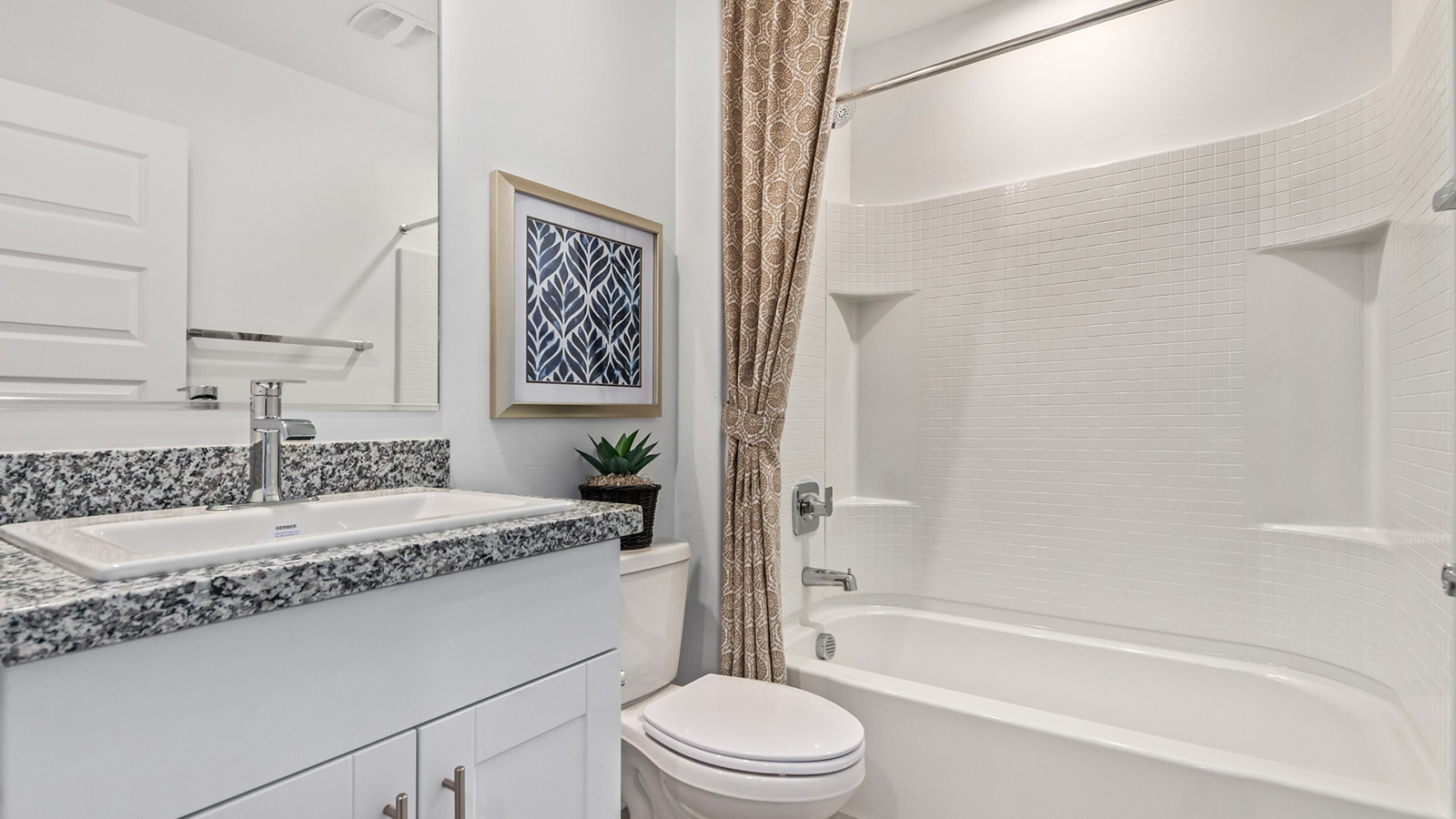 Introducing The Kate at Barnett Village in Marana, Arizona – the only two-story home in the community, offering an impressive 2,264 sq. ft. of living space designed to accommodate families of all sizes with ease and style.  As you enter through the charming front porch, you're greeted by an inviting entryway that leads directly into the heart of the home. The spacious great room opens up ahead, seamlessly connecting to the dining area and the gourmet kitchen. This open-concept space is perfect for entertaining, allowing for a natural flow from meal preparation to dining to relaxation. The kitchen features sleek granite countertops, a large island with a breakfast bar, modern appliances, and a walk-in pantry, making it both functional and stylish.  Tucked away on the main floor is a powder room, adding convenience for guests and everyday living.   Heading upstairs, you'll discover the family’s private quarters. The master suite is a true retreat, offering a generously sized bedroom, a large walk-in closet, and an en-suite bathroom complete with dual vanities and a walk-in shower. The upper level also includes three additional bedrooms, a full bathroom, and a versatile game room that can easily serve as a playroom, media room, or even a second living area.  For added convenience, the laundry room is located on the upper level, making household chores a breeze. The Kate also includes a two-car garage and energy-efficient features, ensuring long-term savings and a comfortable living environment.  Step outside from the great room to the covered patio, where you can enjoy Arizona’s stunning desert landscapes. Whether you’re hosting an outdoor gathering or simply relaxing after a long day, this space extends your living area and enhances the home’s inviting ambiance.  Designed with energy efficiency in mind, The Kate at Barnett Village is DOE Zero Energy Ready Home certified, combining sustainability with modern comfort.