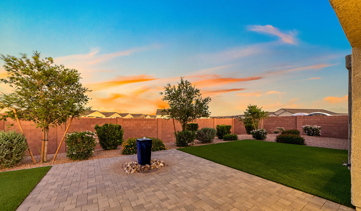 Welcome to The Harris at Barnett Village in Marana, Arizona – our beautifully designed home, offering 1,856 sq. ft. of modern living space that combines elegance with functionality.  Step through the inviting front porch and into a thoughtfully planned interior that begins with a welcoming entryway. This home features two of the four bedrooms near the entrance of the home, both sharing easy access to a full bathroom. These rooms are perfect for guests, children, or even a home office, providing comfort for various lifestyle needs.  As you continue through the spacious great room is revealed, the central hub of the home that seamlessly connects to the dining area and kitchen. The kitchen is a chef’s delight, complete with quartz countertops, large island with a breakfast bar, walk-in pantry, and state-of-the-art appliances.  Adjacent to the great room, a private hallway leads to the primary suite – a tranquil retreat within the home. The primary bedroom features a large walk-in closet and en-suite bathroom. Additionally, the suite offers direct access to a powder room, enhancing the convenience and privacy of this luxurious space.  The Harris also includes a utility room and a two-car garage adding to the home’s practical features, ensuring that daily routines are smooth and efficient.  Step outside to the covered patio, where you can unwind and take in the scenic beauty of Barnett Village. Whether you’re enjoying a quiet morning coffee or hosting a lively evening gathering, this outdoor space extends your living area and provides the perfect backdrop for Arizona’s desert landscapes.  *Images shown are for reference only. They depict The Harris sales model home and may not represent the actual home.