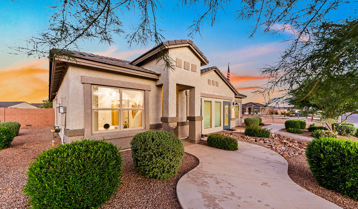 Welcome to The Harris at Barnett Village in Marana, Arizona – our beautifully designed home, offering 1,856 sq. ft. of modern living space that combines elegance with functionality.  Step through the inviting front porch and into a thoughtfully planned interior that begins with a welcoming entryway. This home features two of the four bedrooms near the entrance of the home, both sharing easy access to a full bathroom. These rooms are perfect for guests, children, or even a home office, providing comfort for various lifestyle needs.  As you continue through the spacious great room is revealed, the central hub of the home that seamlessly connects to the dining area and kitchen. The kitchen is a chef’s delight, complete with quartz countertops, large island with a breakfast bar, walk-in pantry, and state-of-the-art appliances.  Adjacent to the great room, a private hallway leads to the primary suite – a tranquil retreat within the home. The primary bedroom features a large walk-in closet and en-suite bathroom. Additionally, the suite offers direct access to a powder room, enhancing the convenience and privacy of this luxurious space.  The Harris also includes a utility room and a two-car garage adding to the home’s practical features, ensuring that daily routines are smooth and efficient.  Step outside to the covered patio, where you can unwind and take in the scenic beauty of Barnett Village. Whether you’re enjoying a quiet morning coffee or hosting a lively evening gathering, this outdoor space extends your living area and provides the perfect backdrop for Arizona’s desert landscapes.  *Images shown are for reference only. They depict The Harris sales model home and may not represent the actual home.