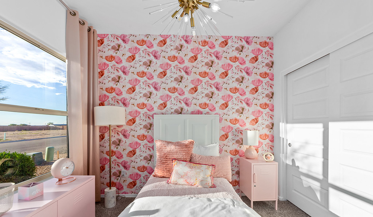 Welcome to The Harris at Barnett Village in Marana, Arizona – our beautifully designed home, offering 1,856 sq. ft. of modern living space that combines elegance with functionality.  Step through the inviting front porch and into a thoughtfully planned interior that begins with a welcoming entryway. This home features two of the four bedrooms near the entrance of the home, both sharing easy access to a full bathroom. These rooms are perfect for guests, children, or even a home office, providing comfort for various lifestyle needs.  As you continue through the spacious great room is revealed, the central hub of the home that seamlessly connects to the dining area and kitchen. The kitchen is a chef’s delight, complete with quartz countertops, large island with a breakfast bar, walk-in pantry, and state-of-the-art appliances.  Adjacent to the great room, a private hallway leads to the primary suite – a tranquil retreat within the home. The primary bedroom features a large walk-in closet and en-suite bathroom. Additionally, the suite offers direct access to a powder room, enhancing the convenience and privacy of this luxurious space.  The Harris also includes a utility room and a two-car garage adding to the home’s practical features, ensuring that daily routines are smooth and efficient.  Step outside to the covered patio, where you can unwind and take in the scenic beauty of Barnett Village. Whether you’re enjoying a quiet morning coffee or hosting a lively evening gathering, this outdoor space extends your living area and provides the perfect backdrop for Arizona’s desert landscapes.  Designed with energy efficiency, The Harris at Barnett Village is DOE Zero Energy Ready Home certified.  *Images shown are for reference only. They depict the sales model home and may not represent the actual home.