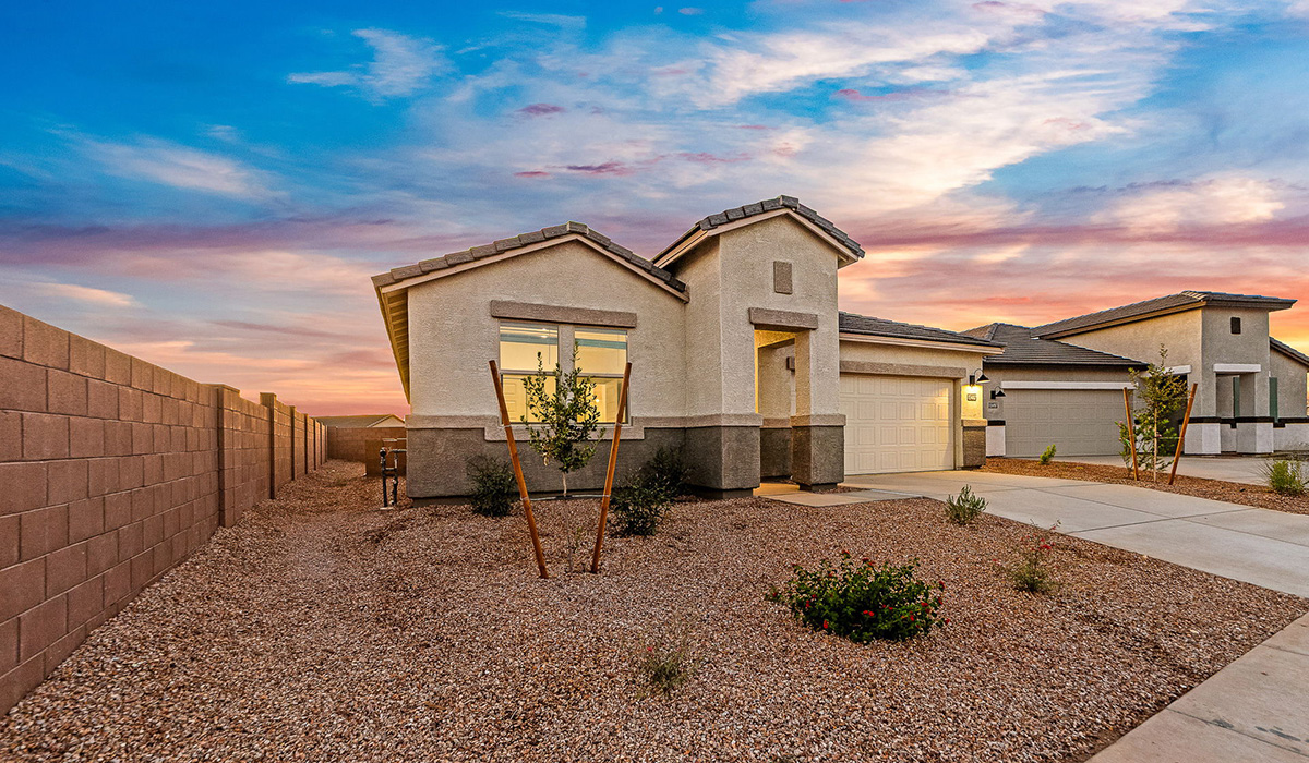 Step into The Dalea at Barnett Village, Marana, Arizona – a perfect blend of comfort, modern living, and energy efficiency. This thoughtfully crafted one-story home spans 2,224 square feet and offers five bedrooms and 3 bathrooms, ideal for families of all sizes.  The open-concept design features a spacious great room that effortlessly connects with the kitchen and dining area, creating an inviting central hub for everyday living and entertaining. The kitchen is equipped with contemporary appliances and a pantry, offering ample storage and convenience for meal preparation.  The primary bedroom, located at the rear of the home, provides a peaceful retreat with a private ensuite bathroom and a generous walk-in closet. The additional four bedrooms are positioned at the front of the house, offering versatility for use as guest rooms, a home office, or children’s bedrooms.  The Dalea floor plan offers the option of a three-car tandem garage, perfect for additional space and larger sized vehicles. Whether it’s morning coffee or evening relaxation, this outdoor space extends your living area into the serene landscape of Barnett Village.  Built with energy efficiency as a priority, the Dalea includes smart home technology, which not only simplifies daily living but also helps reduce utility costs.