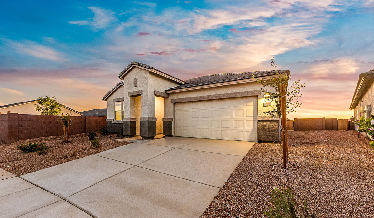 Step into The Dalea at Barnett Village, Marana, Arizona – a perfect blend of comfort, modern living, and energy efficiency. This thoughtfully crafted one-story home spans 2,224 square feet and offers five bedrooms and 3 bathrooms, ideal for families of all sizes.  The open-concept design features a spacious great room that effortlessly connects with the kitchen and dining area, creating an inviting central hub for everyday living and entertaining. The kitchen is equipped with contemporary appliances and a pantry, offering ample storage and convenience for meal preparation.  The primary bedroom, located at the rear of the home, provides a peaceful retreat with a private ensuite bathroom and a generous walk-in closet. The additional four bedrooms are positioned at the front of the house, offering versatility for use as guest rooms, a home office, or children’s bedrooms.  The Dalea floor plan offers the option of a three-car tandem garage, perfect for additional space and larger sized vehicles. Whether it’s morning coffee or evening relaxation, this outdoor space extends your living area into the serene landscape of Barnett Village.  Built with energy efficiency as a priority, the Dalea includes smart home technology, which not only simplifies daily living but also helps reduce utility costs.