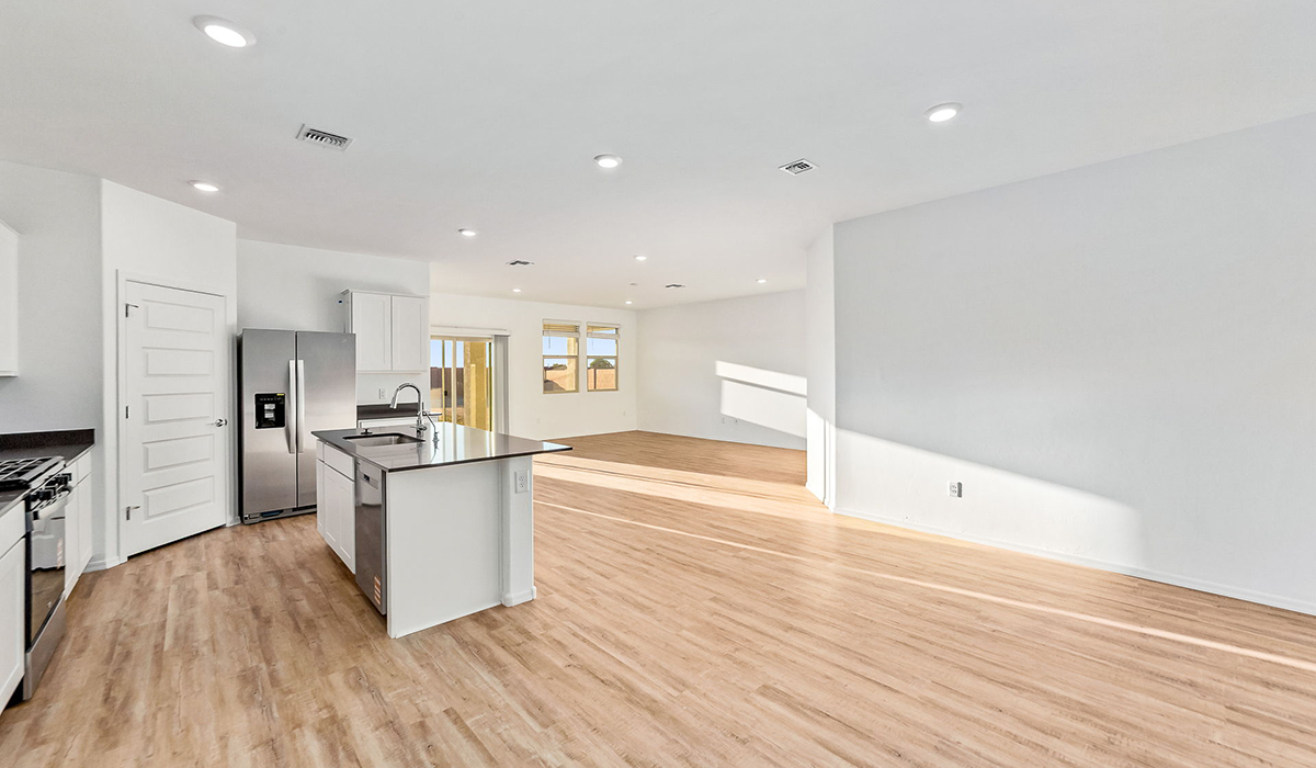Step into The Dalea at Barnett Village, Marana, Arizona – a perfect blend of comfort, modern living, and energy efficiency. This thoughtfully crafted one-story home spans 2,224 square feet and offers five bedrooms and 3 bathrooms, ideal for families of all sizes.  The open-concept design features a spacious great room that effortlessly connects with the kitchen and dining area, creating an inviting central hub for everyday living and entertaining. The kitchen is equipped with contemporary appliances and a pantry, offering ample storage and convenience for meal preparation.  The primary bedroom, located at the rear of the home, provides a peaceful retreat with a private ensuite bathroom and a generous walk-in closet. The additional four bedrooms are positioned at the front of the house, offering versatility for use as guest rooms, a home office, or children’s bedrooms.  The Dalea floor plan offers the option of a three-car tandem garage, perfect for additional space and larger sized vehicles. Whether it’s morning coffee or evening relaxation, this outdoor space extends your living area into the serene landscape of Barnett Village.  Built with energy efficiency as a priority, the Dalea includes smart home technology, which not only simplifies daily living but also helps reduce utility costs.  *Images shown are for reference only. They depict The Dalea spec home and may not represent the actual home.