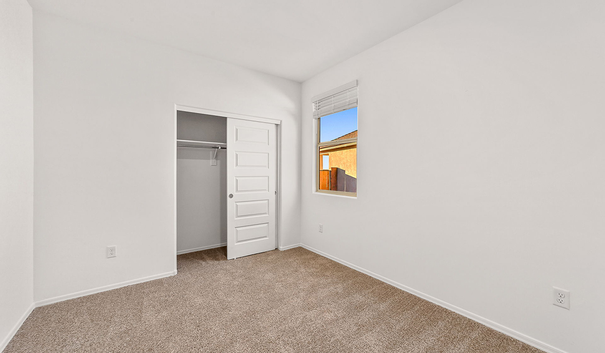 Step into The Dalea at Barnett Village, Marana, Arizona – a perfect blend of comfort, modern living, and energy efficiency. This thoughtfully crafted one-story home spans 2,224 square feet and offers five bedrooms and 3 bathrooms, ideal for families of all sizes.  The open-concept design features a spacious great room that effortlessly connects with the kitchen and dining area, creating an inviting central hub for everyday living and entertaining. The kitchen is equipped with contemporary appliances and a pantry, offering ample storage and convenience for meal preparation.  The primary bedroom, located at the rear of the home, provides a peaceful retreat with a private ensuite bathroom and a generous walk-in closet. The additional four bedrooms are positioned at the front of the house, offering versatility for use as guest rooms, a home office, or children’s bedrooms.  The Dalea floor plan offers the option of a three-car tandem garage, perfect for additional space and larger sized vehicles. Whether it’s morning coffee or evening relaxation, this outdoor space extends your living area into the serene landscape of Barnett Village.  Built with energy efficiency as a priority, the Dalea includes smart home technology, which not only simplifies daily living but also helps reduce utility costs.  *Images shown are for reference only. They depict The Dalea spec home and may not represent the actual home.