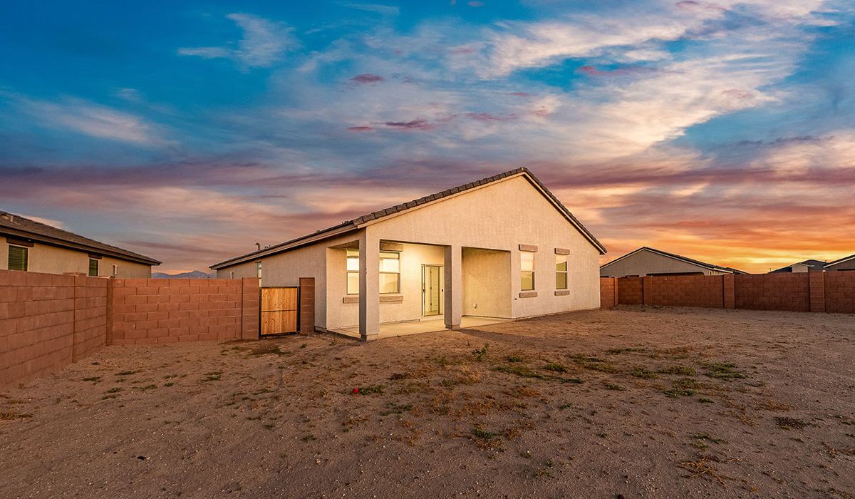 Step into The Dalea at Barnett Village, Marana, Arizona – a perfect blend of comfort, modern living, and energy efficiency. This thoughtfully crafted one-story home spans 2,224 square feet and offers five bedrooms and 3 bathrooms, ideal for families of all sizes.  The open-concept design features a spacious great room that effortlessly connects with the kitchen and dining area, creating an inviting central hub for everyday living and entertaining. The kitchen is equipped with contemporary appliances and a pantry, offering ample storage and convenience for meal preparation.  The primary bedroom, located at the rear of the home, provides a peaceful retreat with a private ensuite bathroom and a generous walk-in closet. The additional four bedrooms are positioned at the front of the house, offering versatility for use as guest rooms, a home office, or children’s bedrooms.  The Dalea floor plan offers the option of a three-car tandem garage, perfect for additional space and larger sized vehicles. Whether it’s morning coffee or evening relaxation, this outdoor space extends your living area into the serene landscape of Barnett Village.  Built with energy efficiency as a priority, the Dalea includes smart home technology, which not only simplifies daily living but also helps reduce utility costs.  *Images shown are for reference only. They depict The Dalea spec home and may not represent the actual home.