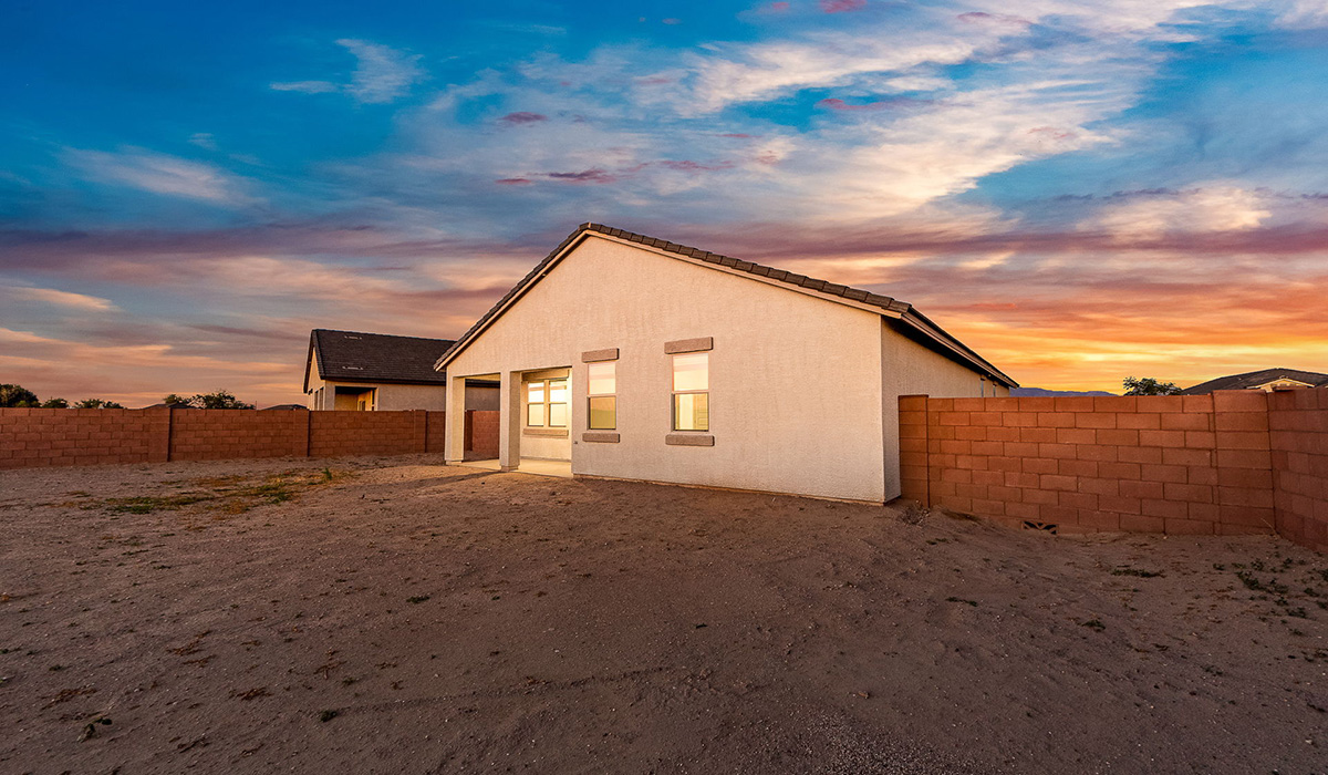 Step into The Dalea at Barnett Village, Marana, Arizona – a perfect blend of comfort, modern living, and energy efficiency. This thoughtfully crafted one-story home spans 2,224 square feet and offers five bedrooms and 3 bathrooms, ideal for families of all sizes.  The open-concept design features a spacious great room that effortlessly connects with the kitchen and dining area, creating an inviting central hub for everyday living and entertaining. The kitchen is equipped with contemporary appliances and a pantry, offering ample storage and convenience for meal preparation.  The primary bedroom, located at the rear of the home, provides a peaceful retreat with a private ensuite bathroom and a generous walk-in closet. The additional four bedrooms are positioned at the front of the house, offering versatility for use as guest rooms, a home office, or children’s bedrooms.  The Dalea floor plan offers the option of a three-car tandem garage, perfect for additional space and larger sized vehicles. Whether it’s morning coffee or evening relaxation, this outdoor space extends your living area into the serene landscape of Barnett Village.  Built with energy efficiency as a priority, the Dalea includes smart home technology, which not only simplifies daily living but also helps reduce utility costs.  *Images shown are for reference only. They depict The Dalea spec home and may not represent the actual home.