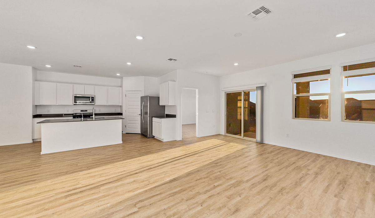 Step into The Dalea at Barnett Village, Marana, Arizona – a perfect blend of comfort, modern living, and energy efficiency. This thoughtfully crafted one-story home spans 2,224 square feet and offers five bedrooms and 3 bathrooms, ideal for families of all sizes.  The open-concept design features a spacious great room that effortlessly connects with the kitchen and dining area, creating an inviting central hub for everyday living and entertaining. The kitchen is equipped with contemporary appliances and a pantry, offering ample storage and convenience for meal preparation.  The primary bedroom, located at the rear of the home, provides a peaceful retreat with a private ensuite bathroom and a generous walk-in closet. The additional four bedrooms are positioned at the front of the house, offering versatility for use as guest rooms, a home office, or children’s bedrooms.  The Dalea floor plan offers the option of a three-car tandem garage, perfect for additional space and larger sized vehicles. Whether it’s morning coffee or evening relaxation, this outdoor space extends your living area into the serene landscape of Barnett Village.  Built with energy efficiency as a priority, the Dalea includes smart home technology, which not only simplifies daily living but also helps reduce utility costs.  *Images shown are for reference only. They depict The Dalea spec home and may not represent the actual home.
