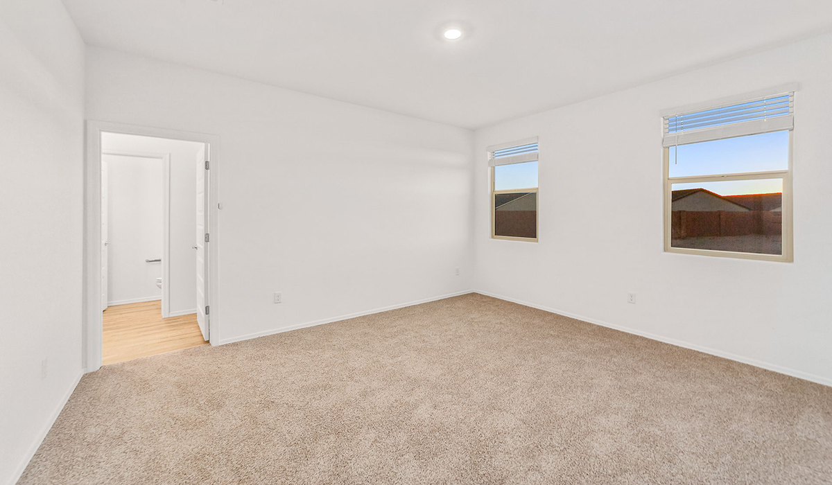Step into The Dalea at Barnett Village, Marana, Arizona – a perfect blend of comfort, modern living, and energy efficiency. This thoughtfully crafted one-story home spans 2,224 square feet and offers five bedrooms and 3 bathrooms, ideal for families of all sizes.  The open-concept design features a spacious great room that effortlessly connects with the kitchen and dining area, creating an inviting central hub for everyday living and entertaining. The kitchen is equipped with contemporary appliances and a pantry, offering ample storage and convenience for meal preparation.  The primary bedroom, located at the rear of the home, provides a peaceful retreat with a private ensuite bathroom and a generous walk-in closet. The additional four bedrooms are positioned at the front of the house, offering versatility for use as guest rooms, a home office, or children’s bedrooms.  The Dalea floor plan offers the option of a three-car tandem garage, perfect for additional space and larger sized vehicles. Whether it’s morning coffee or evening relaxation, this outdoor space extends your living area into the serene landscape of Barnett Village.  Built with energy efficiency as a priority, the Dalea includes smart home technology, which not only simplifies daily living but also helps reduce utility costs.  *Images shown are for reference only. They depict the Dalea floor plan but may not represent the actual home and design package.