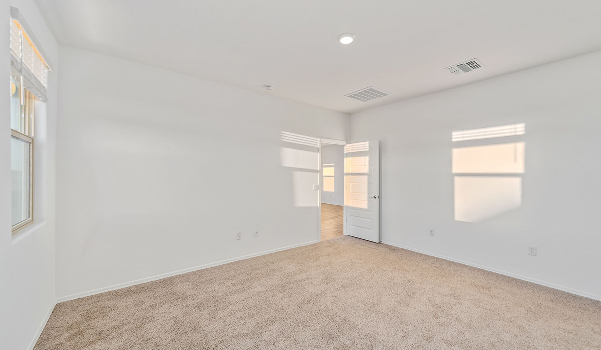Step into The Dalea at Barnett Village, Marana, Arizona – a perfect blend of comfort, modern living, and energy efficiency. This thoughtfully crafted one-story home spans 2,224 square feet and offers five bedrooms and 3 bathrooms, ideal for families of all sizes.  The open-concept design features a spacious great room that effortlessly connects with the kitchen and dining area, creating an inviting central hub for everyday living and entertaining. The kitchen is equipped with contemporary appliances and a pantry, offering ample storage and convenience for meal preparation.  The primary bedroom, located at the rear of the home, provides a peaceful retreat with a private ensuite bathroom and a generous walk-in closet. The additional four bedrooms are positioned at the front of the house, offering versatility for use as guest rooms, a home office, or children’s bedrooms.  The Dalea floor plan offers the option of a three-car tandem garage, perfect for additional space and larger sized vehicles. Whether it’s morning coffee or evening relaxation, this outdoor space extends your living area into the serene landscape of Barnett Village.  Built with energy efficiency as a priority, the Dalea includes smart home technology, which not only simplifies daily living but also helps reduce utility costs.  *Images shown are for reference only. They depict the Dalea floor plan but may not represent the actual home and design package.