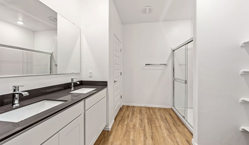 Step into The Dalea at Barnett Village, Marana, Arizona – a perfect blend of comfort, modern living, and energy efficiency. This thoughtfully crafted one-story home spans 2,224 square feet and offers five bedrooms and 3 bathrooms, ideal for families of all sizes.  The open-concept design features a spacious great room that effortlessly connects with the kitchen and dining area, creating an inviting central hub for everyday living and entertaining. The kitchen is equipped with contemporary appliances and a pantry, offering ample storage and convenience for meal preparation.  The primary bedroom, located at the rear of the home, provides a peaceful retreat with a private ensuite bathroom and a generous walk-in closet. The additional four bedrooms are positioned at the front of the house, offering versatility for use as guest rooms, a home office, or children’s bedrooms.  The Dalea floor plan offers the option of a three-car tandem garage, perfect for additional space and larger sized vehicles. Whether it’s morning coffee or evening relaxation, this outdoor space extends your living area into the serene landscape of Barnett Village.  Built with energy efficiency as a priority, the Dalea includes smart home technology, which not only simplifies daily living but also helps reduce utility costs.