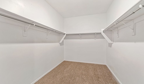 Step into The Dalea at Barnett Village, Marana, Arizona – a perfect blend of comfort, modern living, and energy efficiency. This thoughtfully crafted one-story home spans 2,224 square feet and offers five bedrooms and 3 bathrooms, ideal for families of all sizes.  The open-concept design features a spacious great room that effortlessly connects with the kitchen and dining area, creating an inviting central hub for everyday living and entertaining. The kitchen is equipped with contemporary appliances and a pantry, offering ample storage and convenience for meal preparation.  The primary bedroom, located at the rear of the home, provides a peaceful retreat with a private ensuite bathroom and a generous walk-in closet. The additional four bedrooms are positioned at the front of the house, offering versatility for use as guest rooms, a home office, or children’s bedrooms.  The Dalea floor plan offers the option of a three-car tandem garage, perfect for additional space and larger sized vehicles. Whether it’s morning coffee or evening relaxation, this outdoor space extends your living area into the serene landscape of Barnett Village.  Built with energy efficiency as a priority, the Dalea includes smart home technology, which not only simplifies daily living but also helps reduce utility costs.