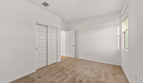 Step into The Dalea at Barnett Village, Marana, Arizona – a perfect blend of comfort, modern living, and energy efficiency. This thoughtfully crafted one-story home spans 2,224 square feet and offers five bedrooms and 3 bathrooms, ideal for families of all sizes.  The open-concept design features a spacious great room that effortlessly connects with the kitchen and dining area, creating an inviting central hub for everyday living and entertaining. The kitchen is equipped with contemporary appliances and a pantry, offering ample storage and convenience for meal preparation.  The primary bedroom, located at the rear of the home, provides a peaceful retreat with a private ensuite bathroom and a generous walk-in closet. The additional four bedrooms are positioned at the front of the house, offering versatility for use as guest rooms, a home office, or children’s bedrooms.  The Dalea floor plan offers the option of a three-car tandem garage, perfect for additional space and larger sized vehicles. Whether it’s morning coffee or evening relaxation, this outdoor space extends your living area into the serene landscape of Barnett Village.  Built with energy efficiency as a priority, the Dalea includes smart home technology, which not only simplifies daily living but also helps reduce utility costs.