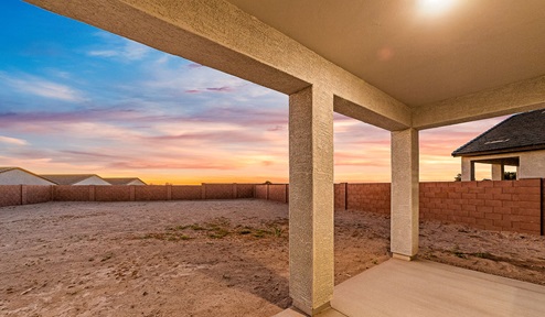 Step into The Dalea at Barnett Village, Marana, Arizona – a perfect blend of comfort, modern living, and energy efficiency. This thoughtfully crafted one-story home spans 2,224 square feet and offers five bedrooms and 3 bathrooms, ideal for families of all sizes.  The open-concept design features a spacious great room that effortlessly connects with the kitchen and dining area, creating an inviting central hub for everyday living and entertaining. The kitchen is equipped with contemporary appliances and a pantry, offering ample storage and convenience for meal preparation.  The primary bedroom, located at the rear of the home, provides a peaceful retreat with a private ensuite bathroom and a generous walk-in closet. The additional four bedrooms are positioned at the front of the house, offering versatility for use as guest rooms, a home office, or children’s bedrooms.  The Dalea floor plan offers the option of a three-car tandem garage, perfect for additional space and larger sized vehicles. Whether it’s morning coffee or evening relaxation, this outdoor space extends your living area into the serene landscape of Barnett Village.  Built with energy efficiency as a priority, the Dalea includes smart home technology, which not only simplifies daily living but also helps reduce utility costs.