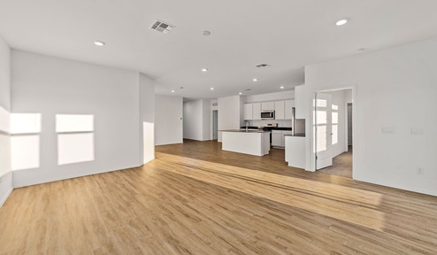 Step into The Dalea at Barnett Village, Marana, Arizona – a perfect blend of comfort, modern living, and energy efficiency. This thoughtfully crafted one-story home spans 2,224 square feet and offers five bedrooms and 3 bathrooms, ideal for families of all sizes.  The open-concept design features a spacious great room that effortlessly connects with the kitchen and dining area, creating an inviting central hub for everyday living and entertaining. The kitchen is equipped with contemporary appliances and a pantry, offering ample storage and convenience for meal preparation.  The primary bedroom, located at the rear of the home, provides a peaceful retreat with a private ensuite bathroom and a generous walk-in closet. The additional four bedrooms are positioned at the front of the house, offering versatility for use as guest rooms, a home office, or children’s bedrooms.  The Dalea floor plan offers the option of a three-car tandem garage, perfect for additional space and larger sized vehicles. Whether it’s morning coffee or evening relaxation, this outdoor space extends your living area into the serene landscape of Barnett Village.  Built with energy efficiency as a priority, the Dalea includes smart home technology, which not only simplifies daily living but also helps reduce utility costs.